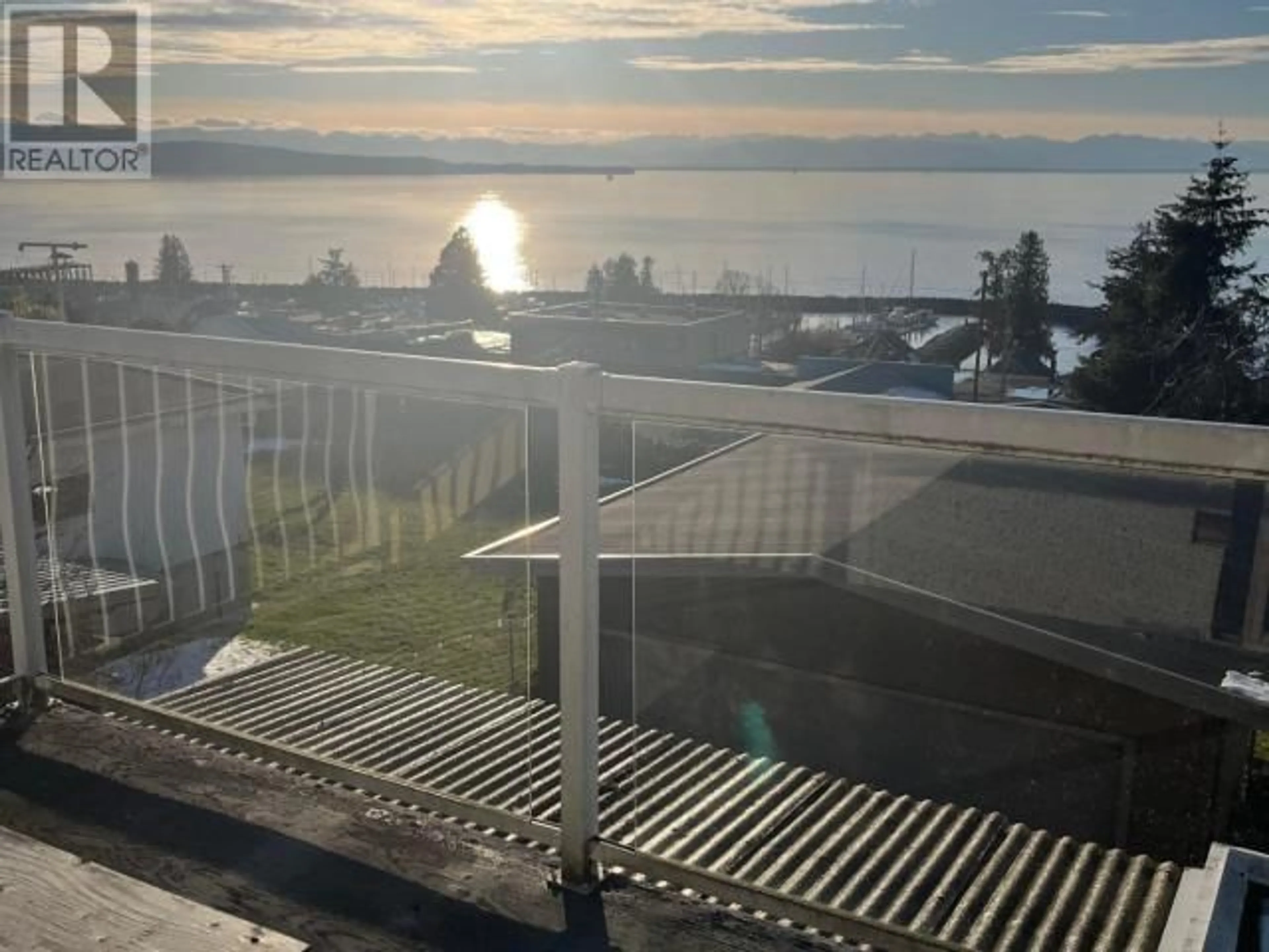 A pic from outside/outdoor area/front of a property/back of a property/a pic from drone, water/lake/river/ocean view for 4579 HARVIE AVE, Powell River British Columbia