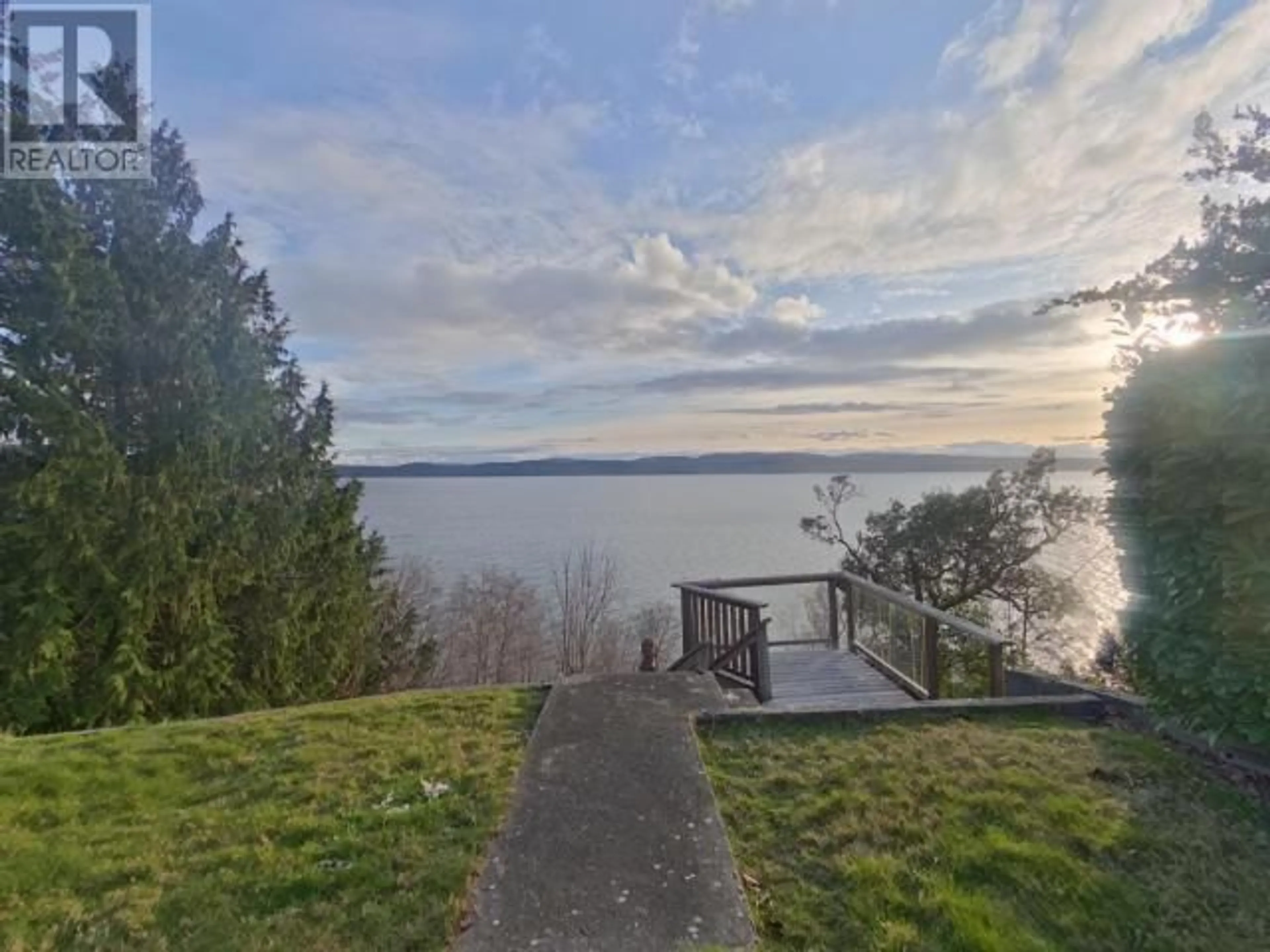 A pic from outside/outdoor area/front of a property/back of a property/a pic from drone, water/lake/river/ocean view for 7160 WESTMINSTER STREET, Powell River British Columbia V8A1C6