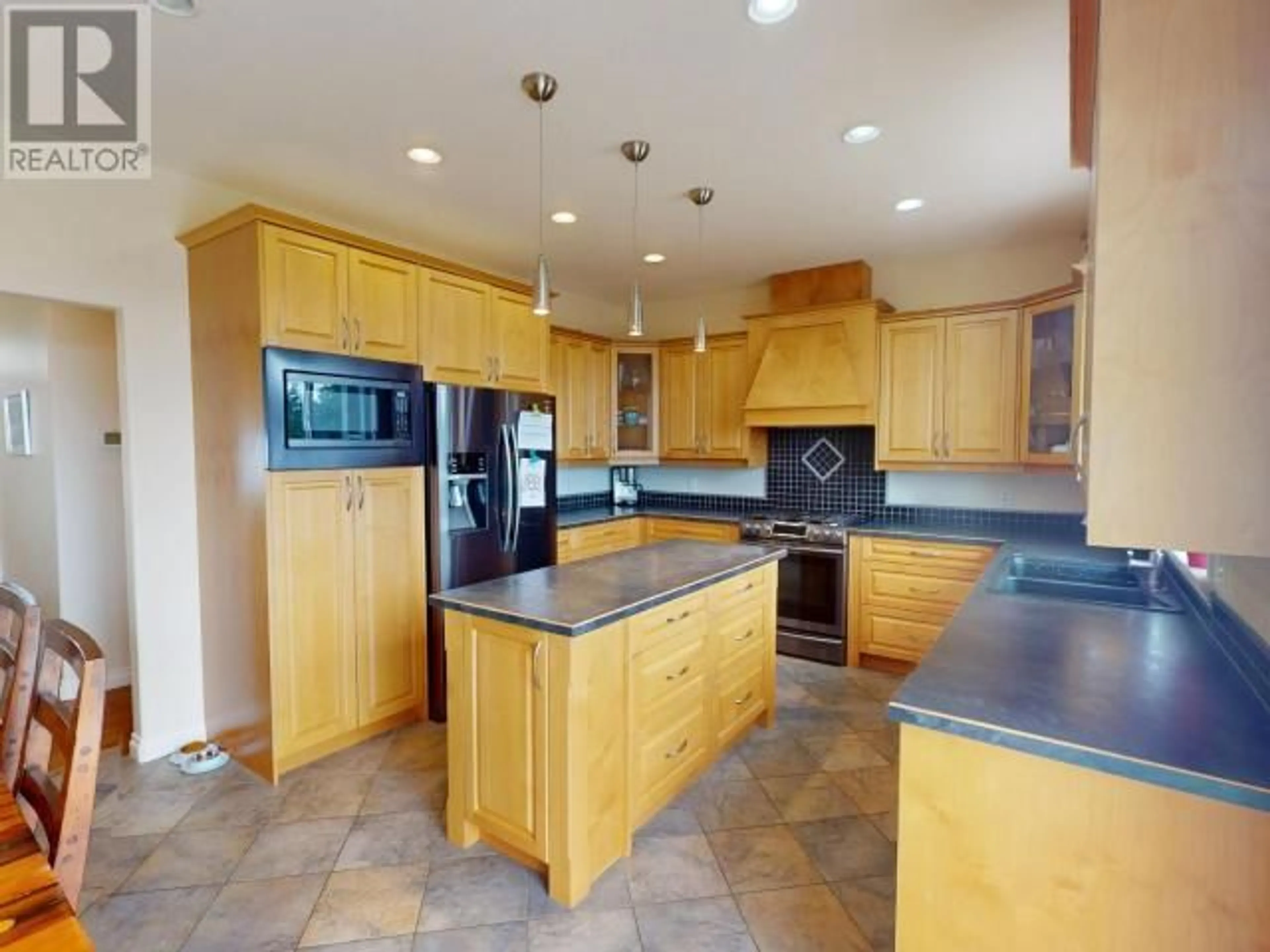 Open concept kitchen, ceramic/tile floor for 4836 LESLEY CRES, Powell River British Columbia