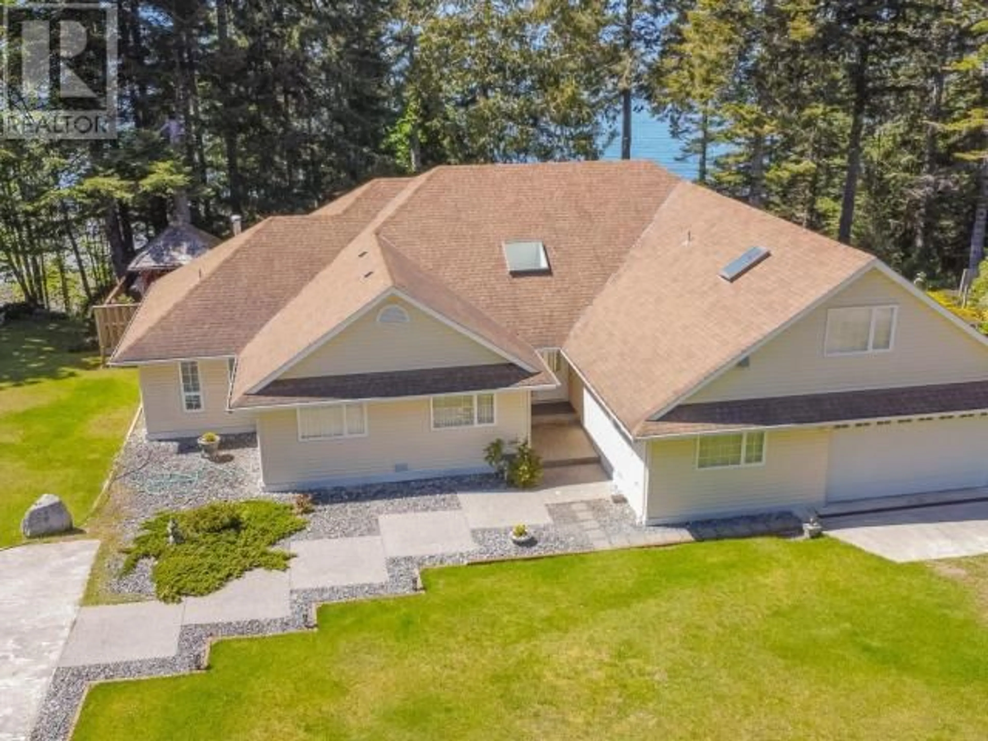 A pic from outside/outdoor area/front of a property/back of a property/a pic from drone, water/lake/river/ocean view for 5832 GILLIES BAY RD ROAD, Texada Island British Columbia