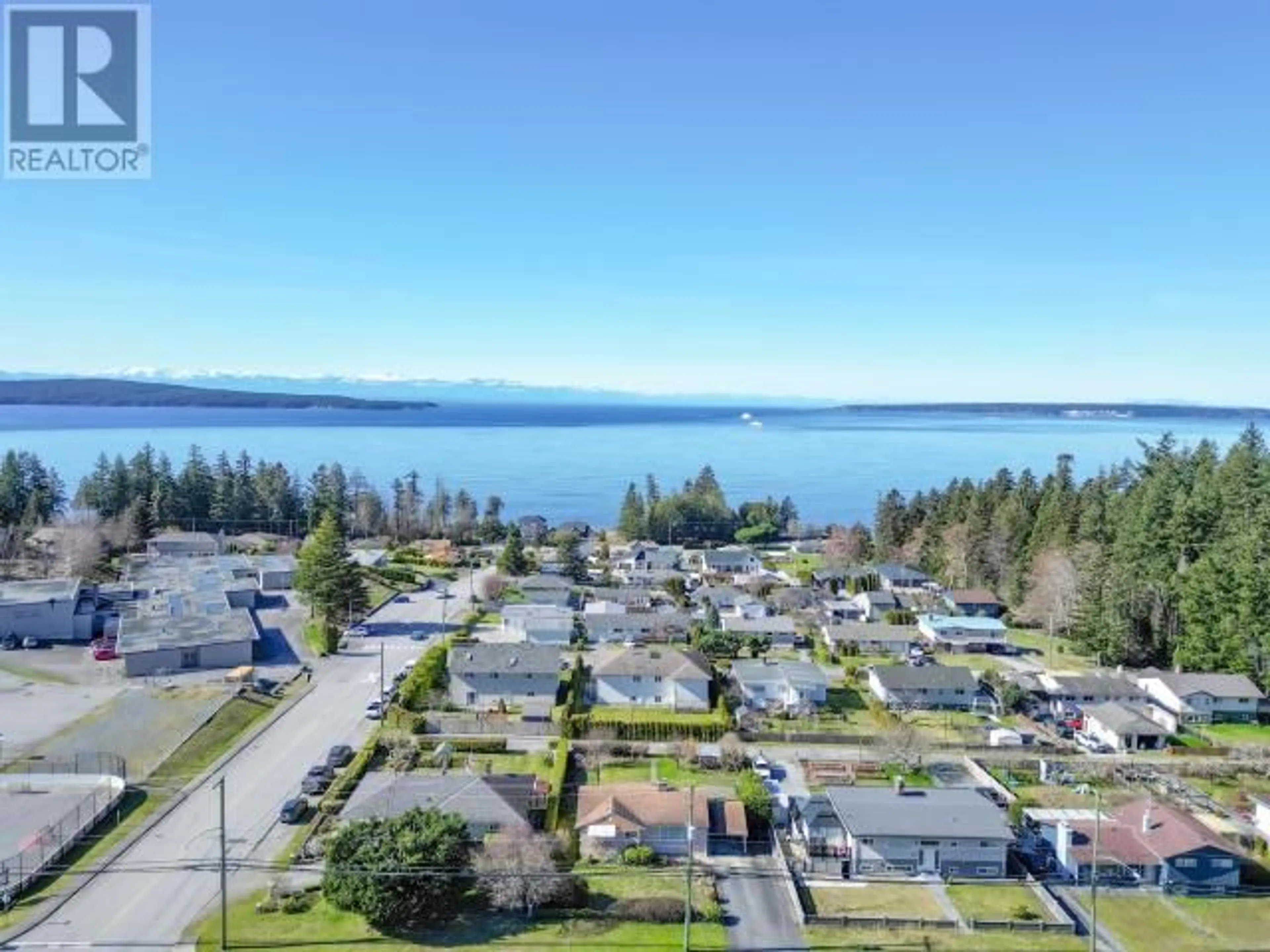 A pic from outside/outdoor area/front of a property/back of a property/a pic from drone, water/lake/river/ocean view for 3609 JOYCE AVE, Powell River British Columbia V8A2Y7