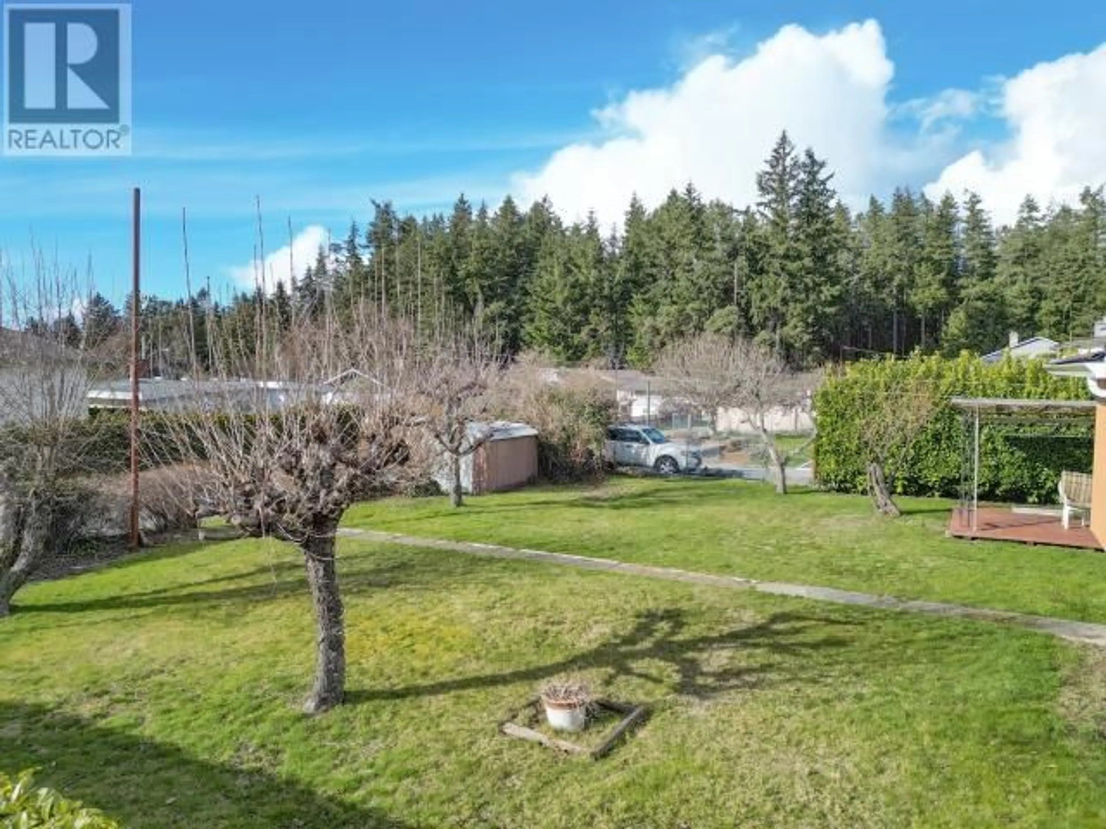 A pic from outside/outdoor area/front of a property/back of a property/a pic from drone, forest/trees view for 3609 JOYCE AVE, Powell River British Columbia V8A2Y7