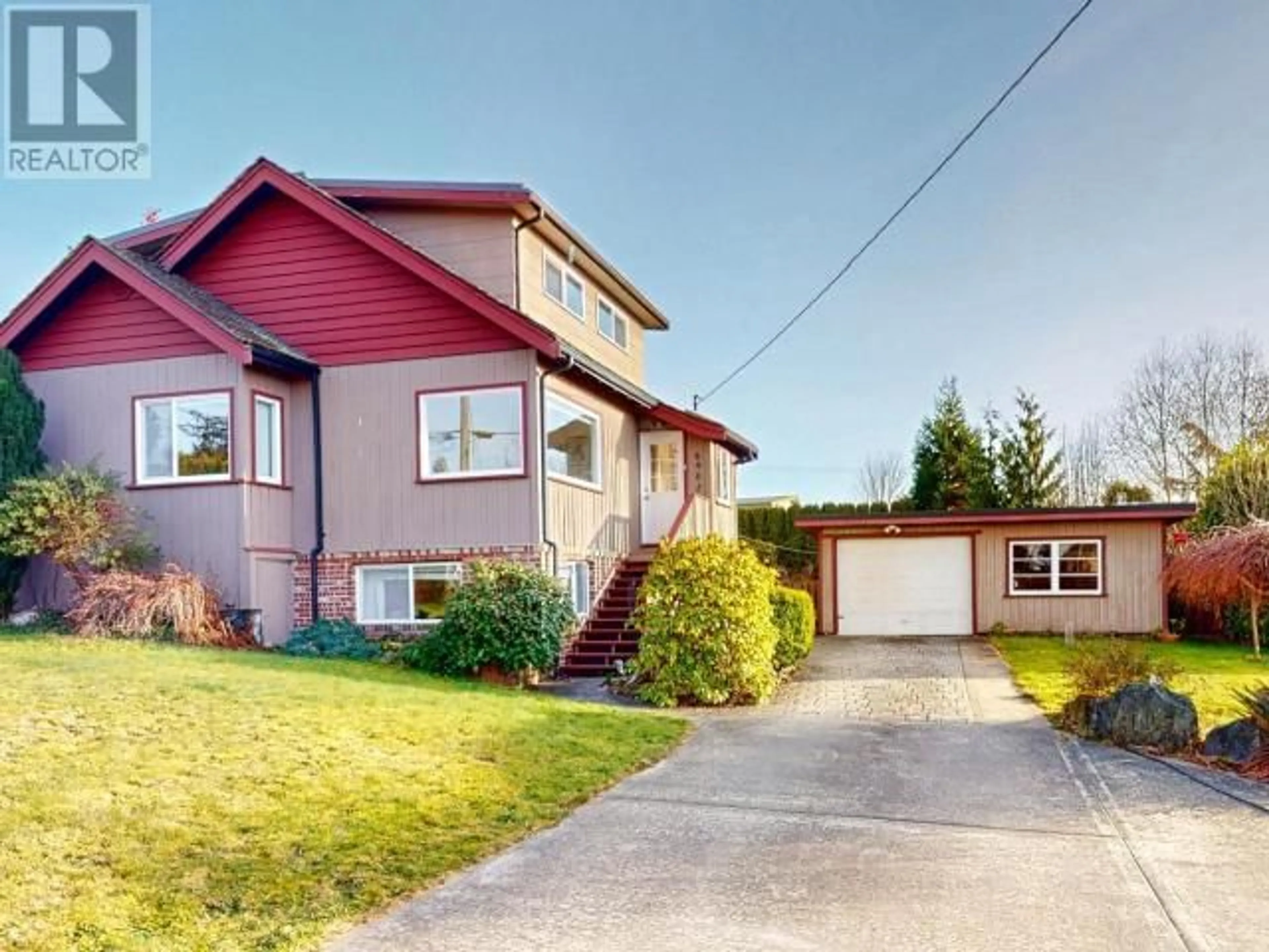 Home with vinyl exterior material, street for 6902 JASPER STREET, Powell River British Columbia