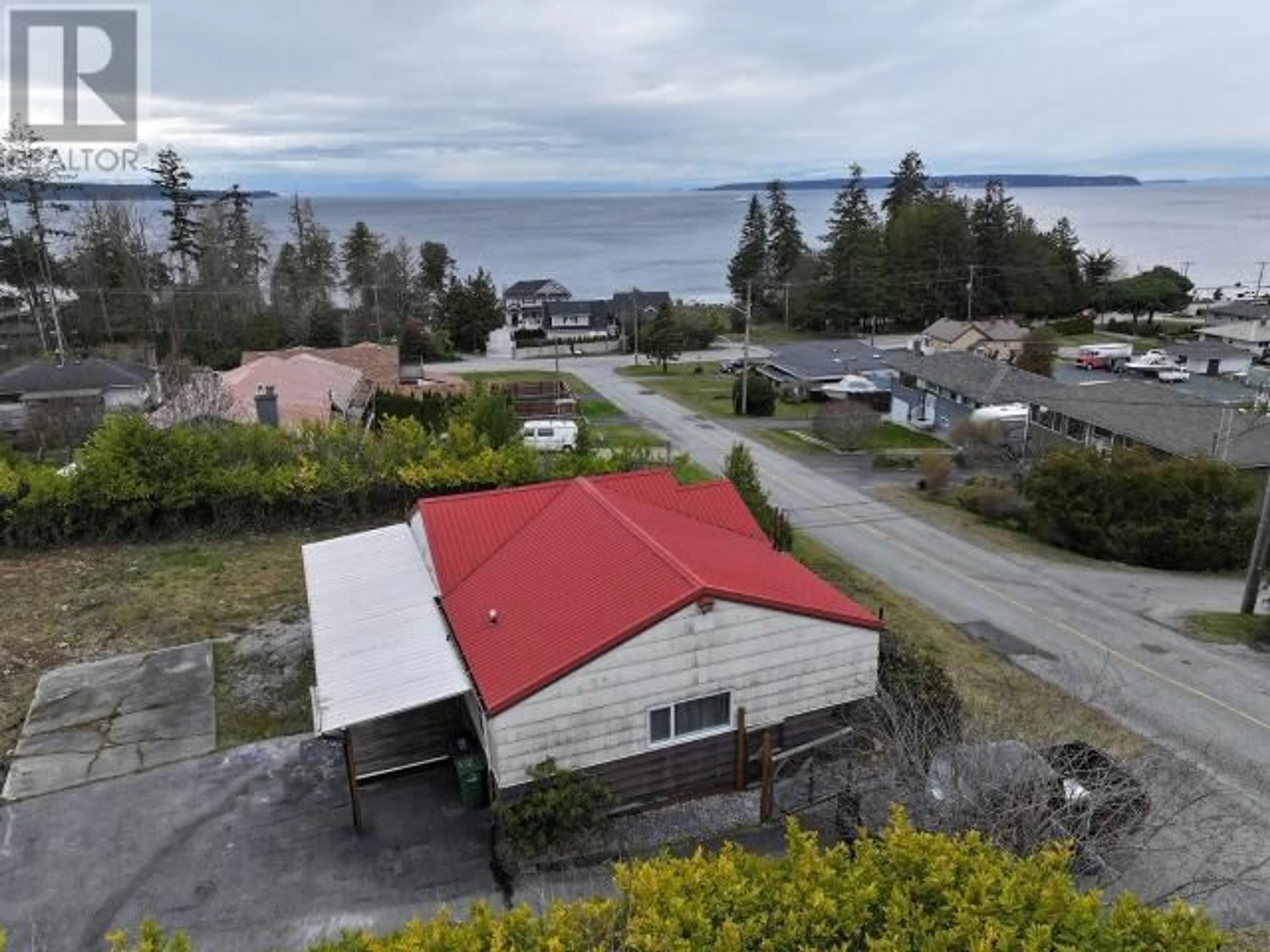 A pic from outside/outdoor area/front of a property/back of a property/a pic from drone, water/lake/river/ocean view for 6928 QUESNEL STREET, Powell River British Columbia
