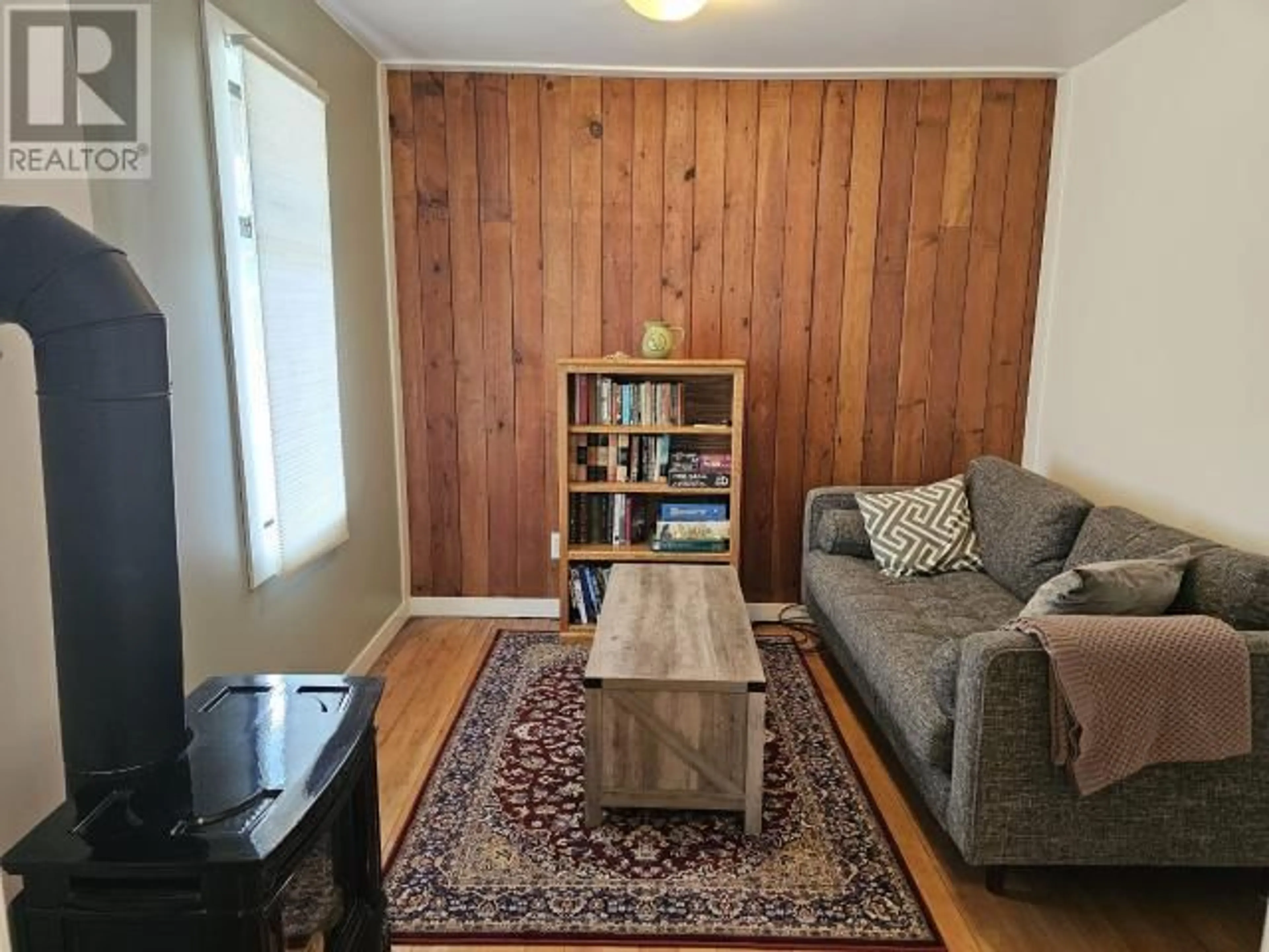 Living room with furniture, wood/laminate floor for 5271 COLEBORN STREET, Texada Island British Columbia V0N3K0