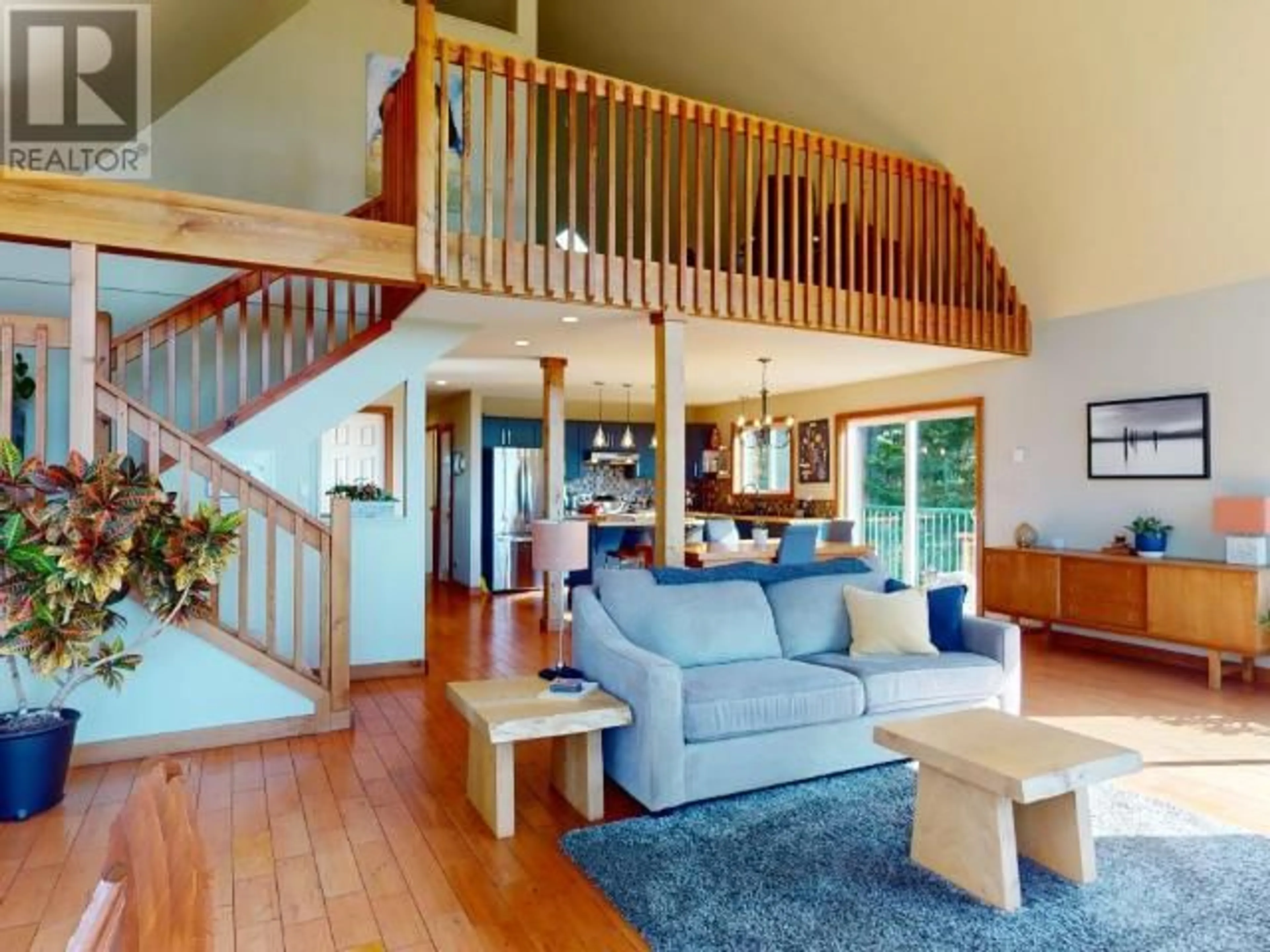 Living room with furniture, wood/laminate floor for 6268 SHELTER POINT ROAD, Texada Island British Columbia V0N3K0