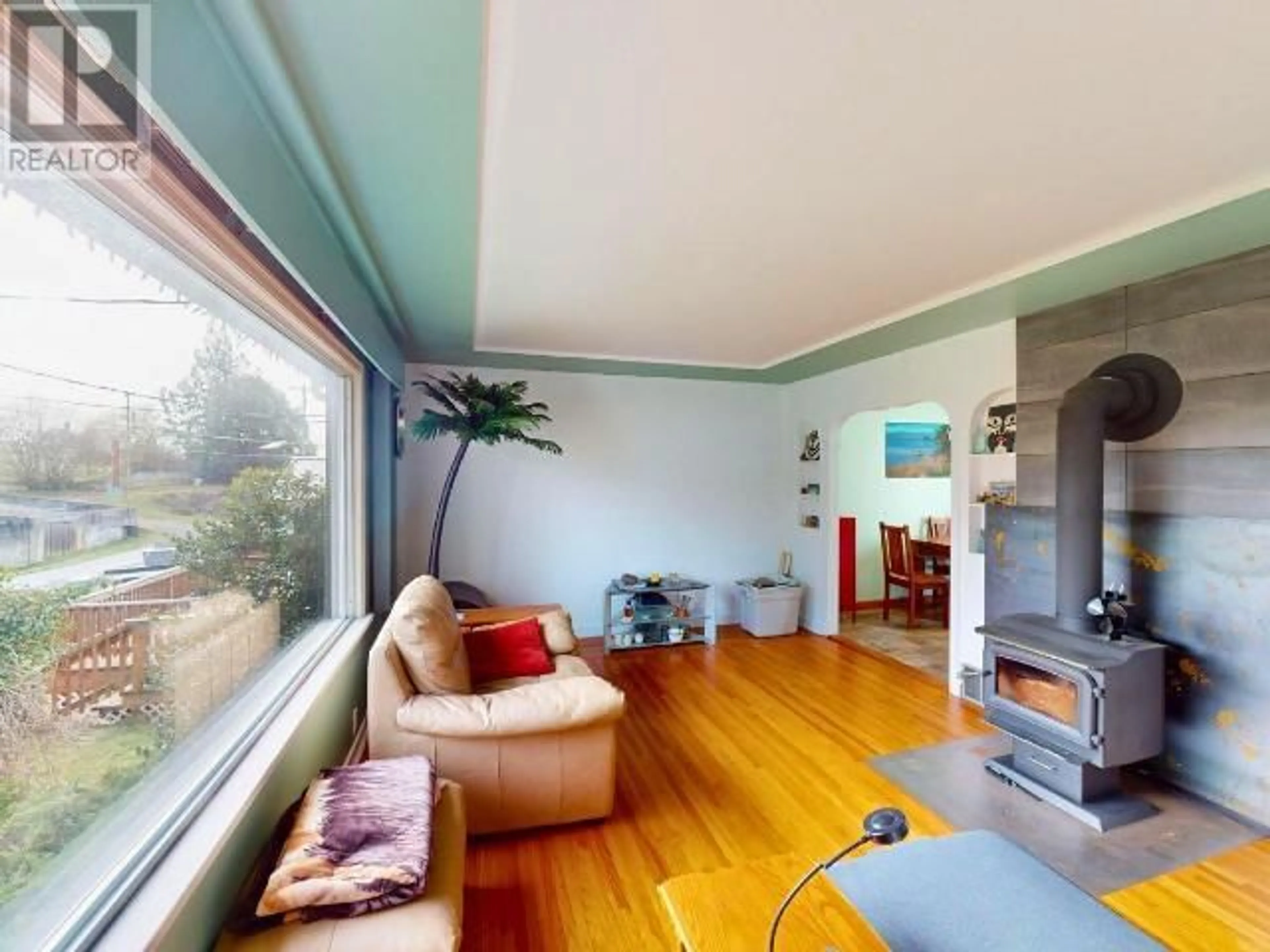 Living room with furniture, wood/laminate floor for 5385 EARL STREET, Texada Island British Columbia V0N3K0