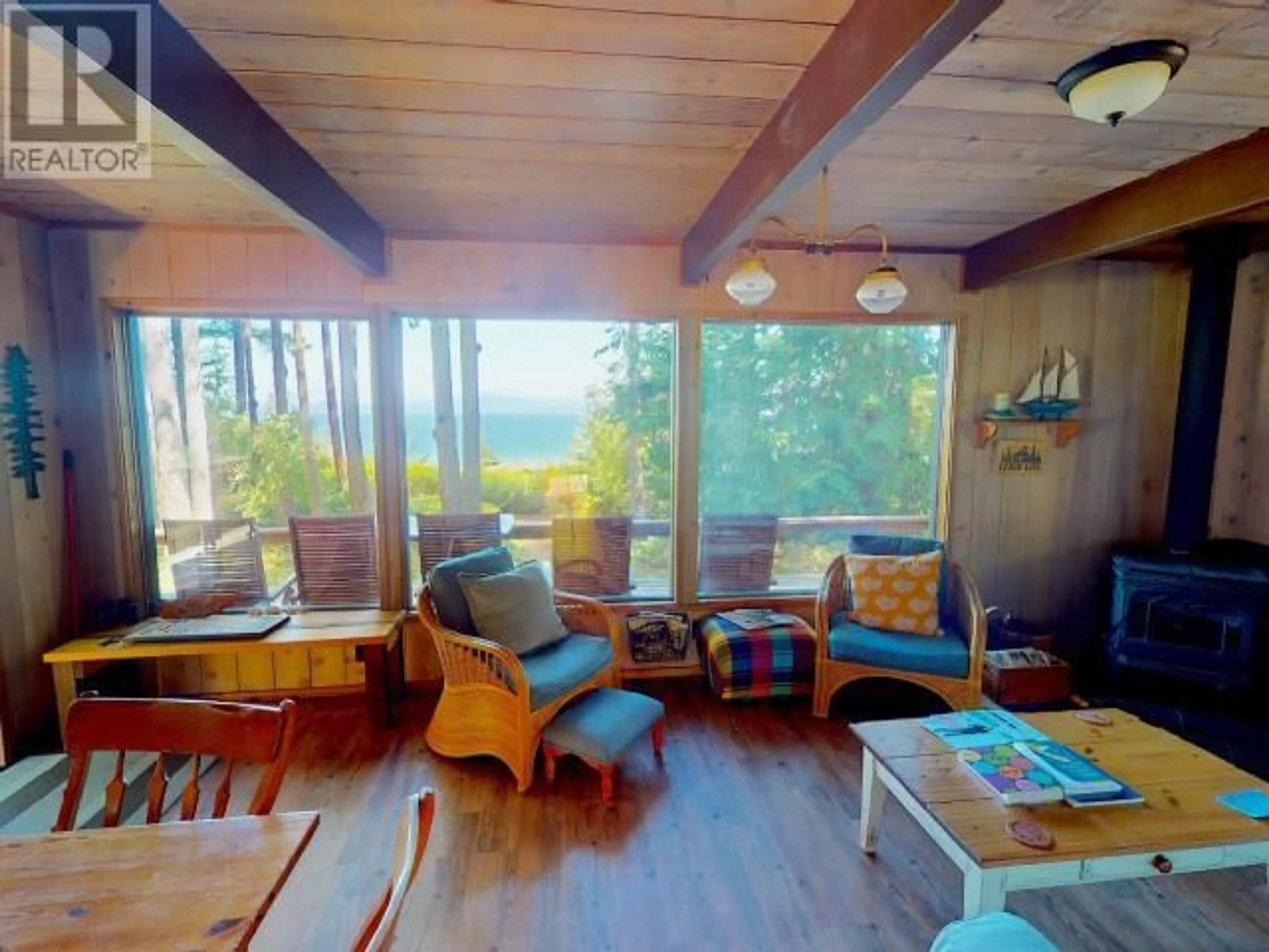 Living room with furniture, wood/laminate floor for 72 - 1576 SAVARY ISLAND ROAD, Savary Island British Columbia