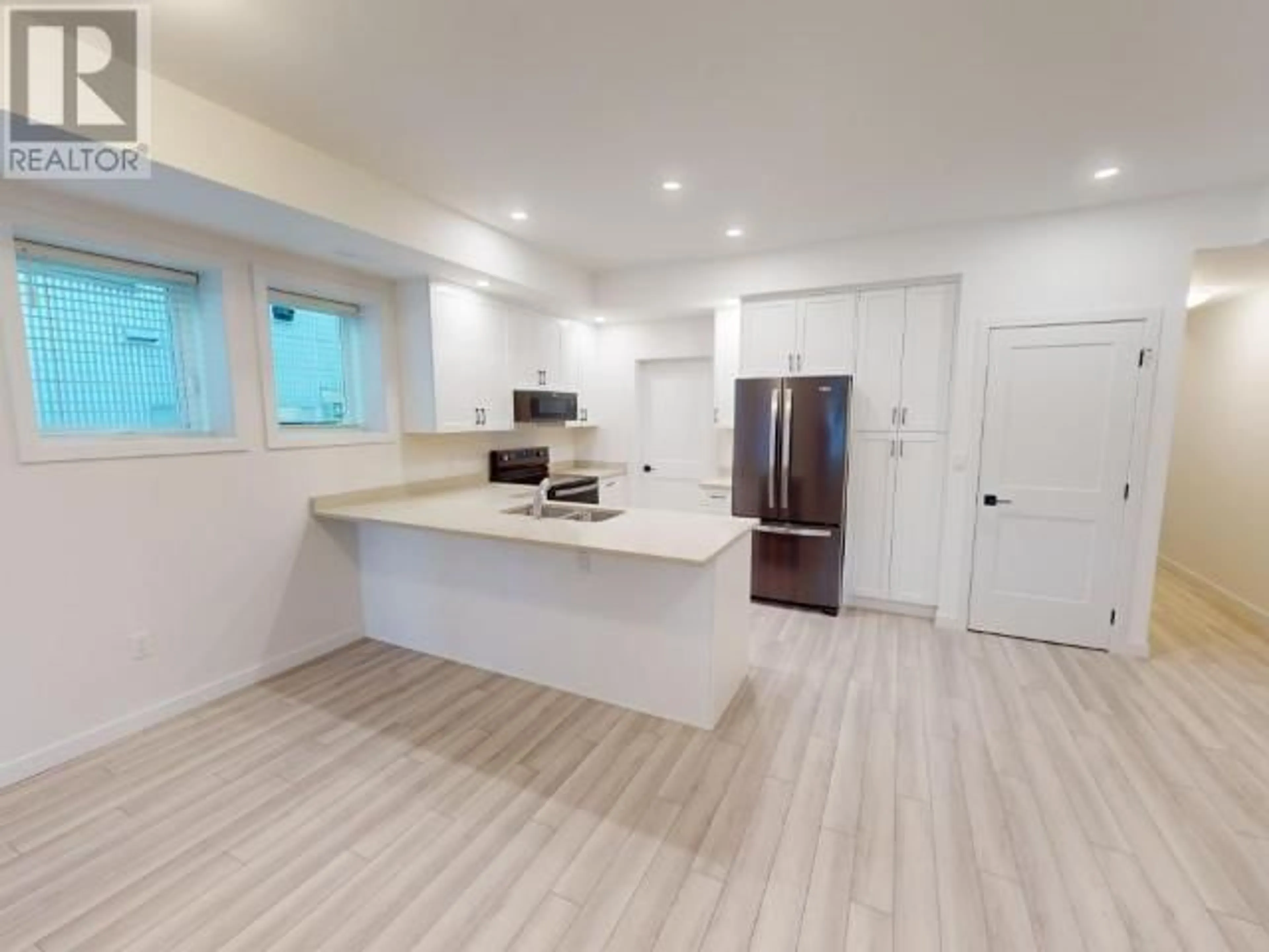Open concept kitchen, unknown for 11-6730 CRANBERRY STREET, Powell River British Columbia V8A3Z4