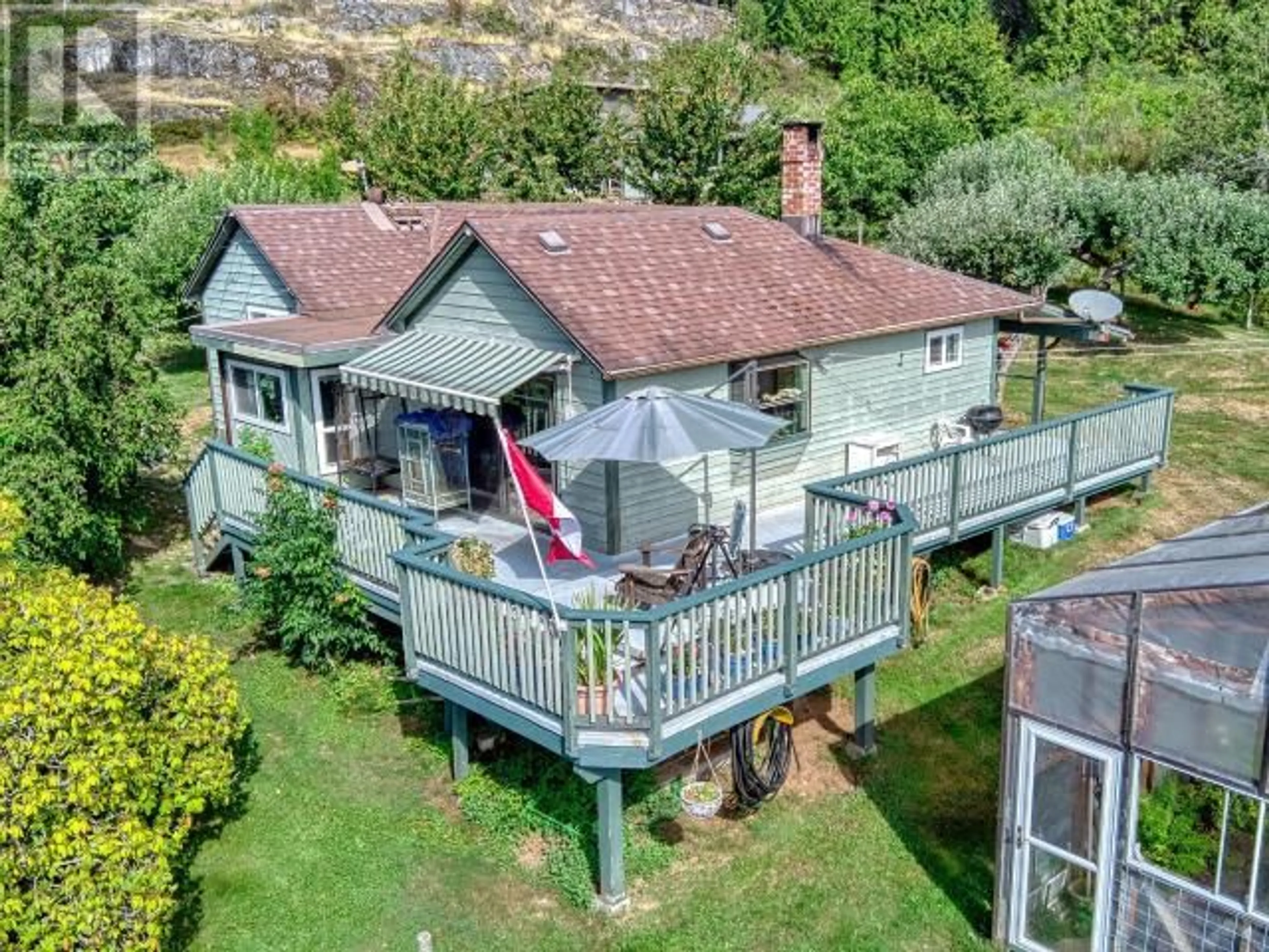 A pic from outside/outdoor area/front of a property/back of a property/a pic from drone, water/lake/river/ocean view for 12328 HIGHWAY 101, Powell River British Columbia V8A0M9