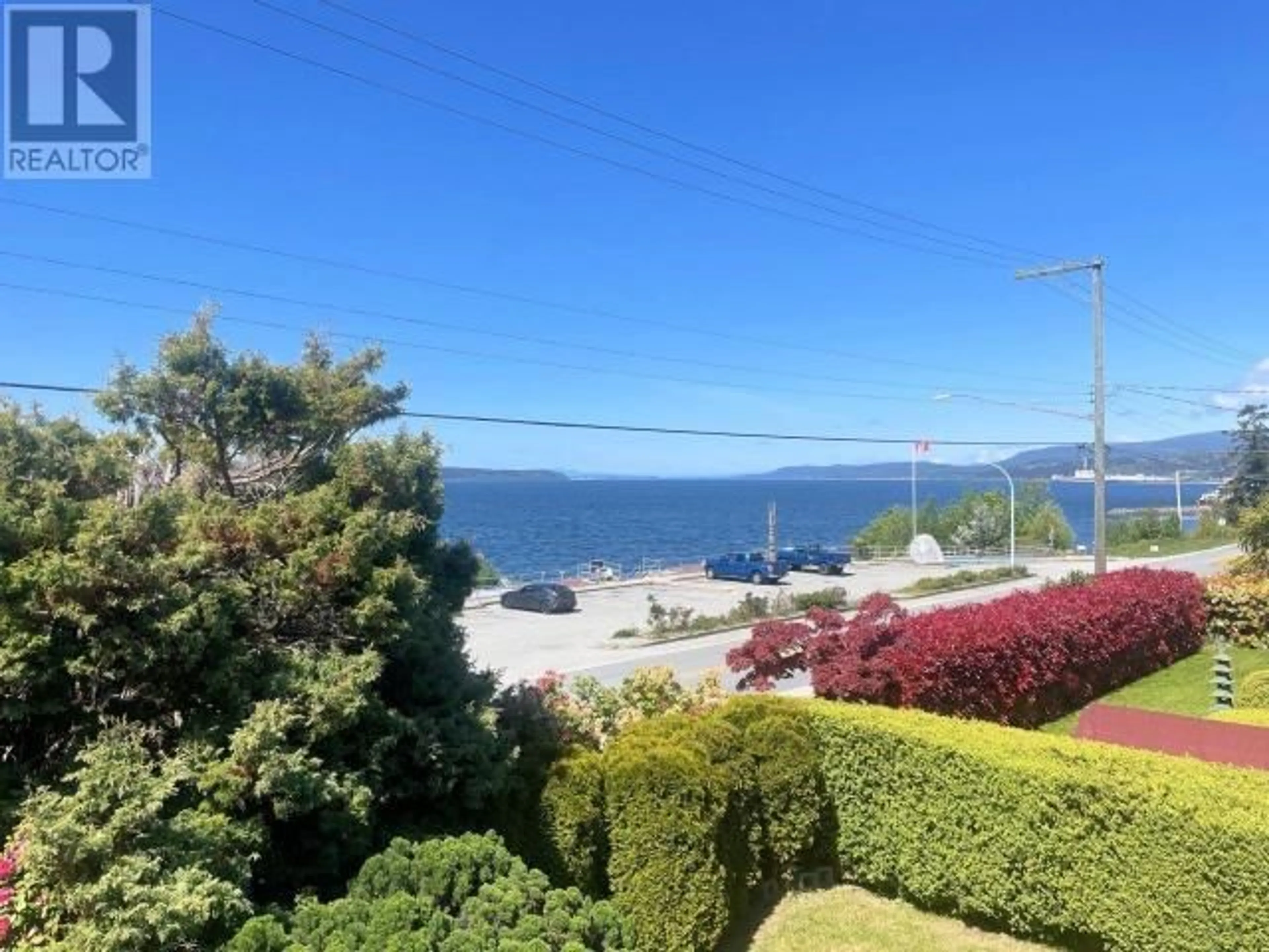 A pic from outside/outdoor area/front of a property/back of a property/a pic from drone, water/lake/river/ocean view for 4096 MARINE AVE, Powell River British Columbia