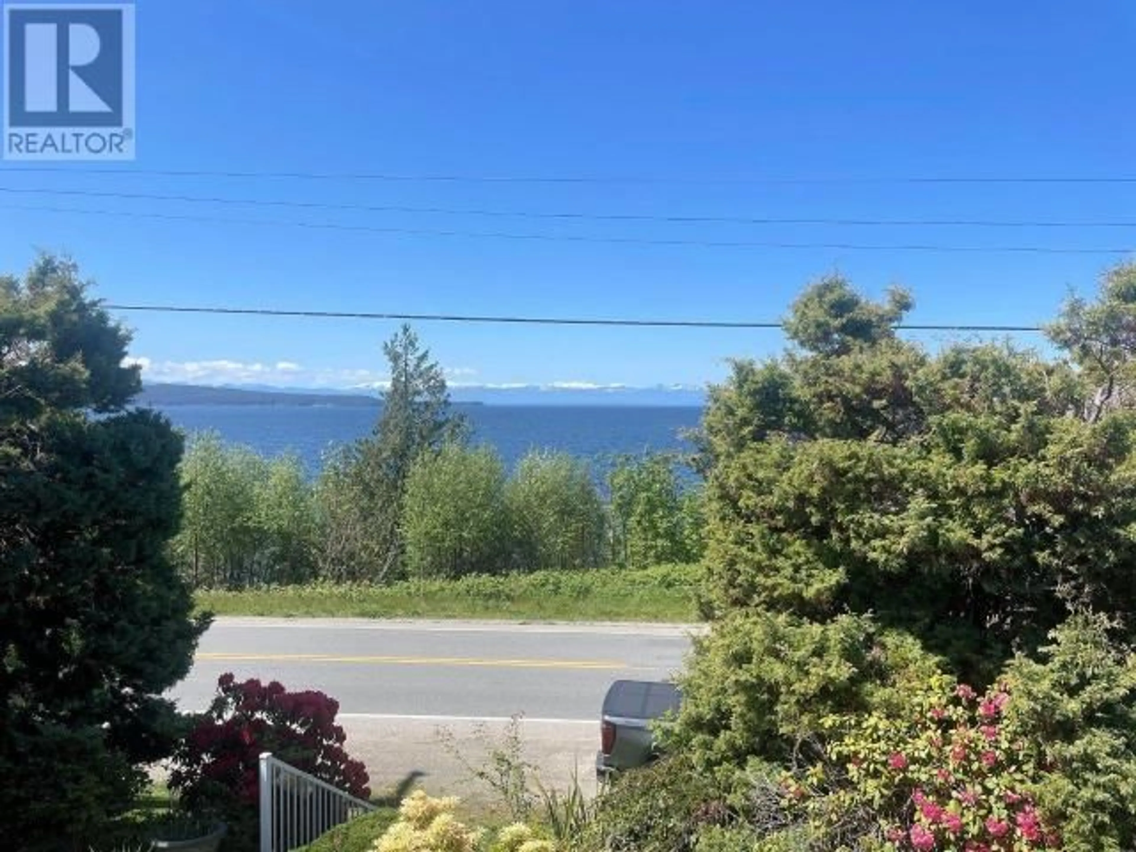 A pic from outside/outdoor area/front of a property/back of a property/a pic from drone, water/lake/river/ocean view for 4096 MARINE AVE, Powell River British Columbia