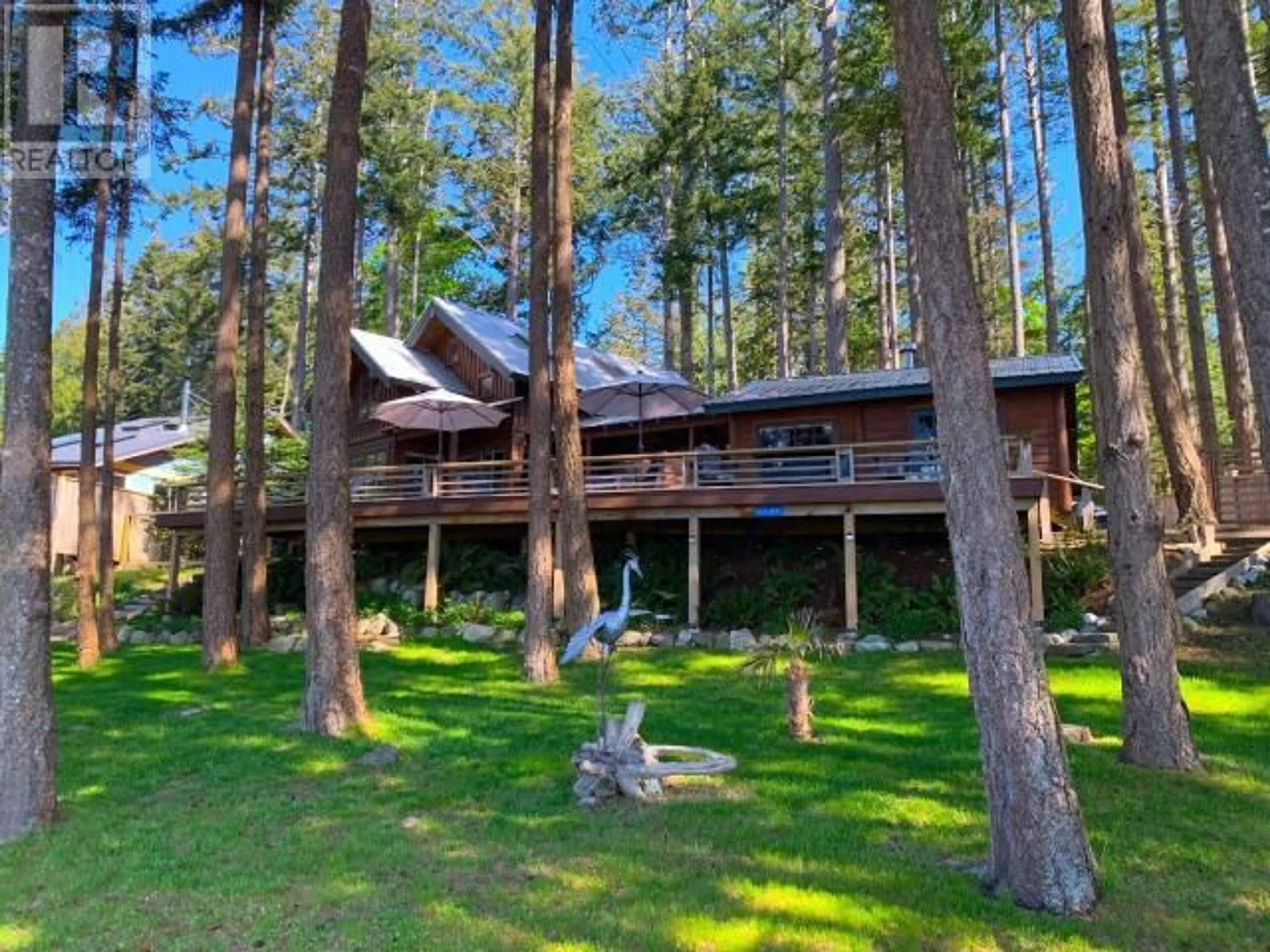 A pic from outside/outdoor area/front of a property/back of a property/a pic from drone, forest/trees view for 1147 SUNSET TRAIL, Savary Island British Columbia