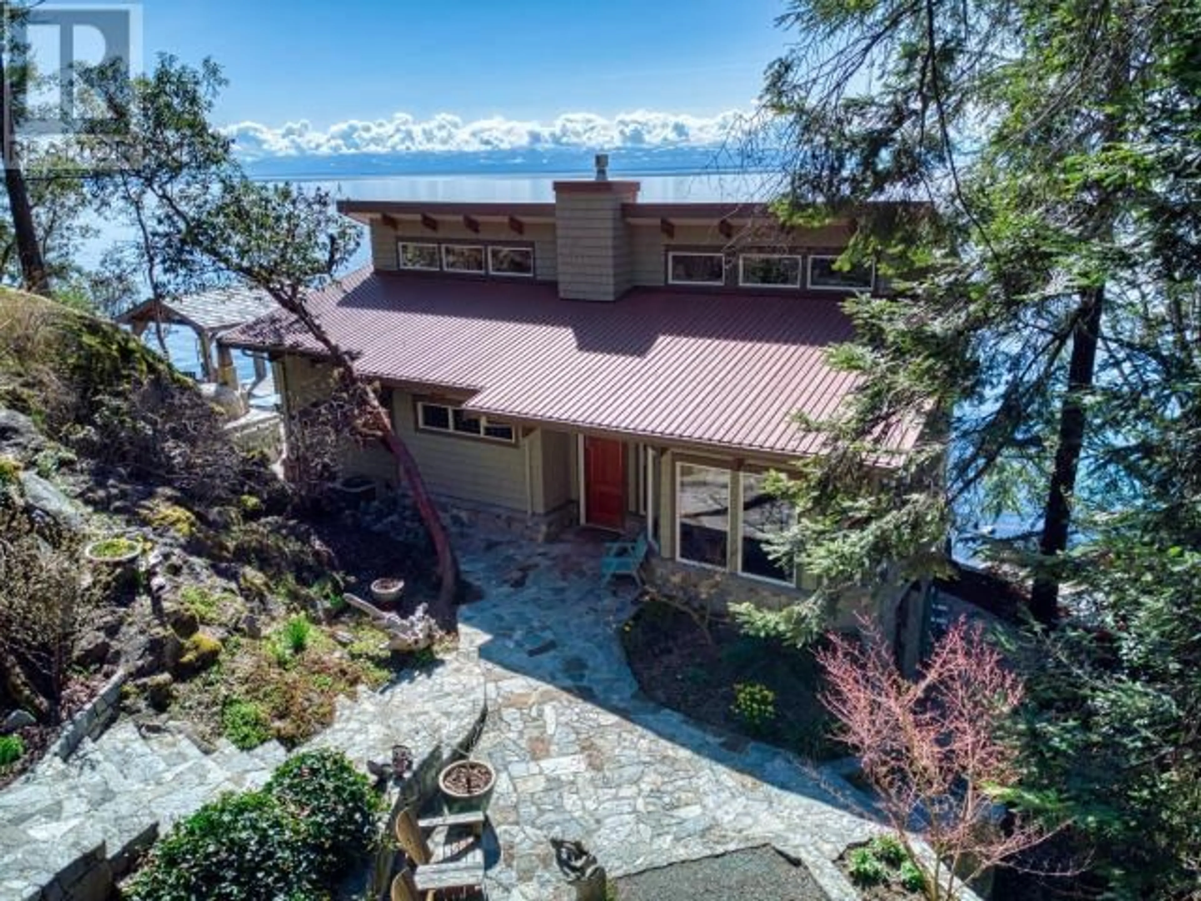 A pic from outside/outdoor area/front of a property/back of a property/a pic from drone, water/lake/river/ocean view for 3391 ATREVIDA ROAD, Powell River British Columbia V8A0E1