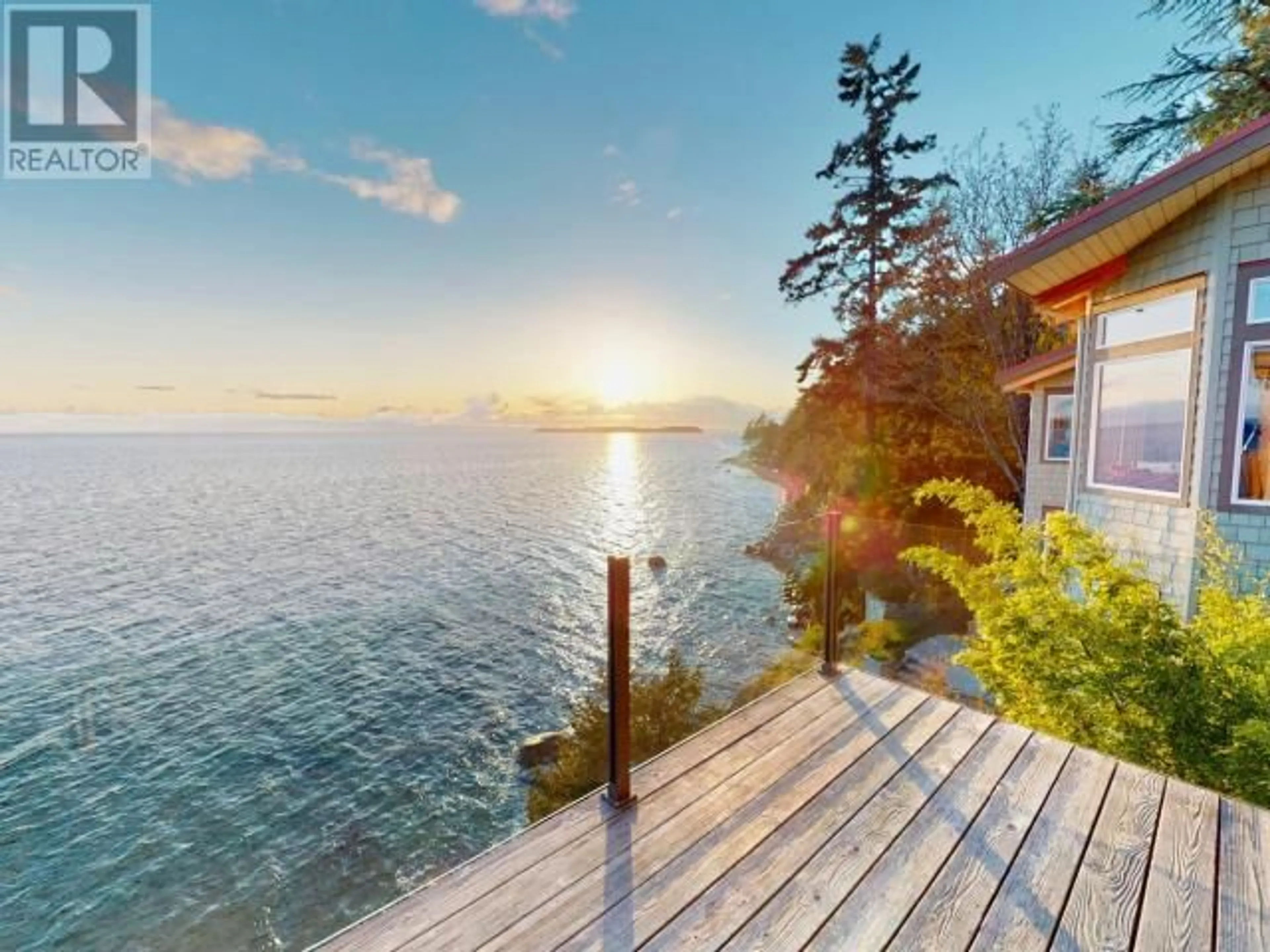 A pic from outside/outdoor area/front of a property/back of a property/a pic from drone, water/lake/river/ocean view for 3391 ATREVIDA ROAD, Powell River British Columbia V8A0E1