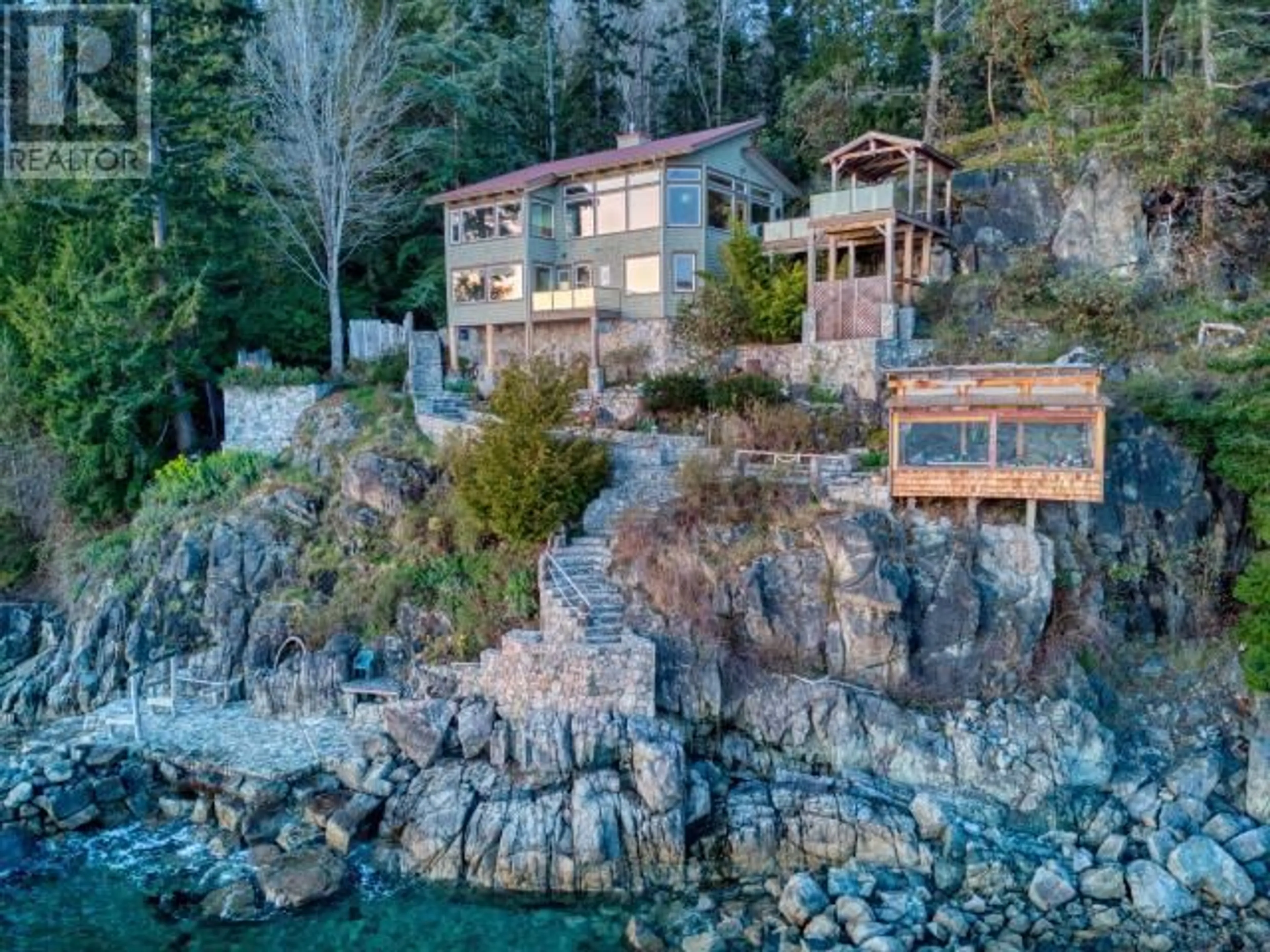A pic from outside/outdoor area/front of a property/back of a property/a pic from drone, water/lake/river/ocean view for 3391 ATREVIDA ROAD, Powell River British Columbia V8A0E1