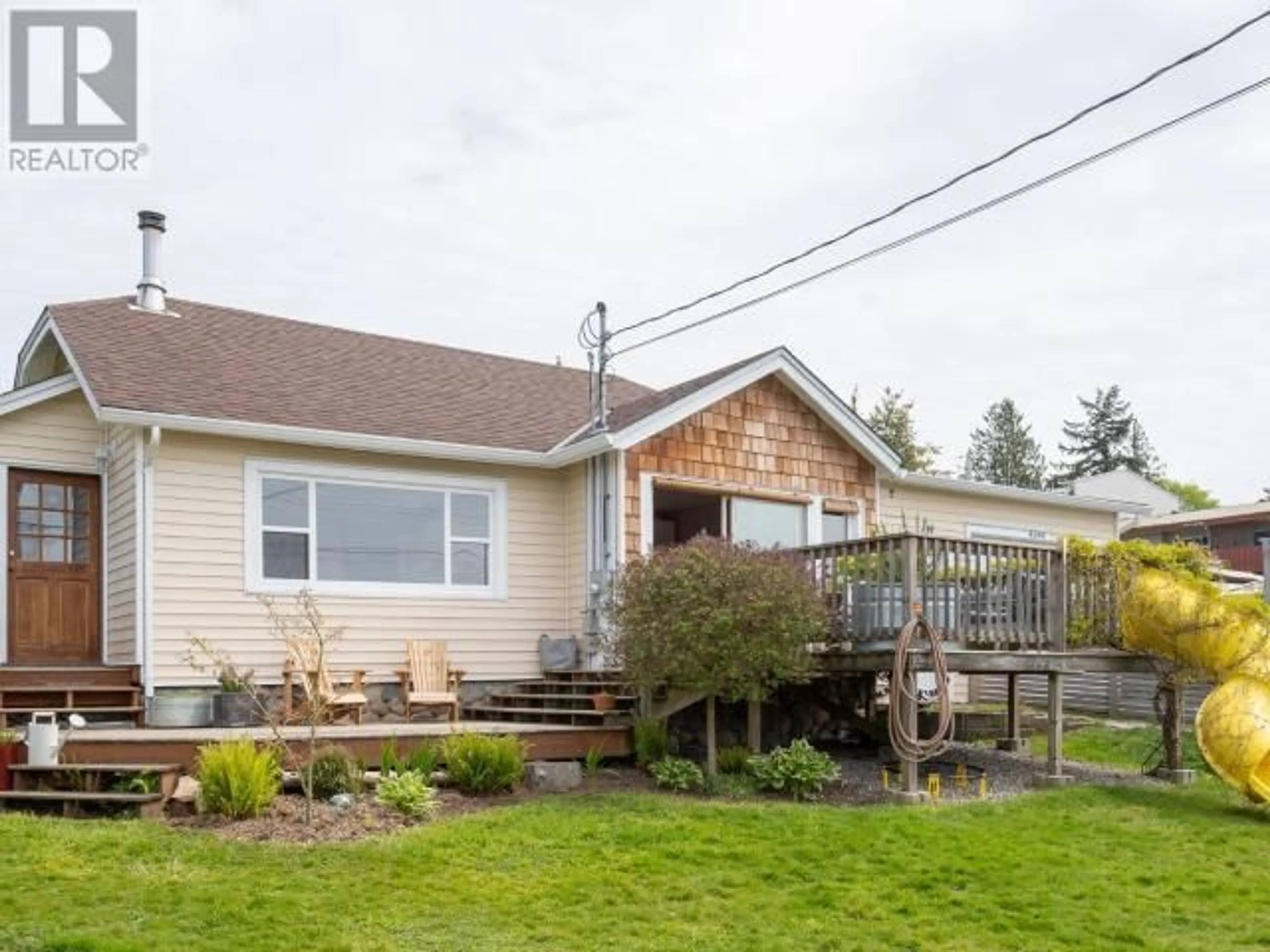Home with vinyl exterior material, street for 4594 HARVIE AVE, Powell River British Columbia