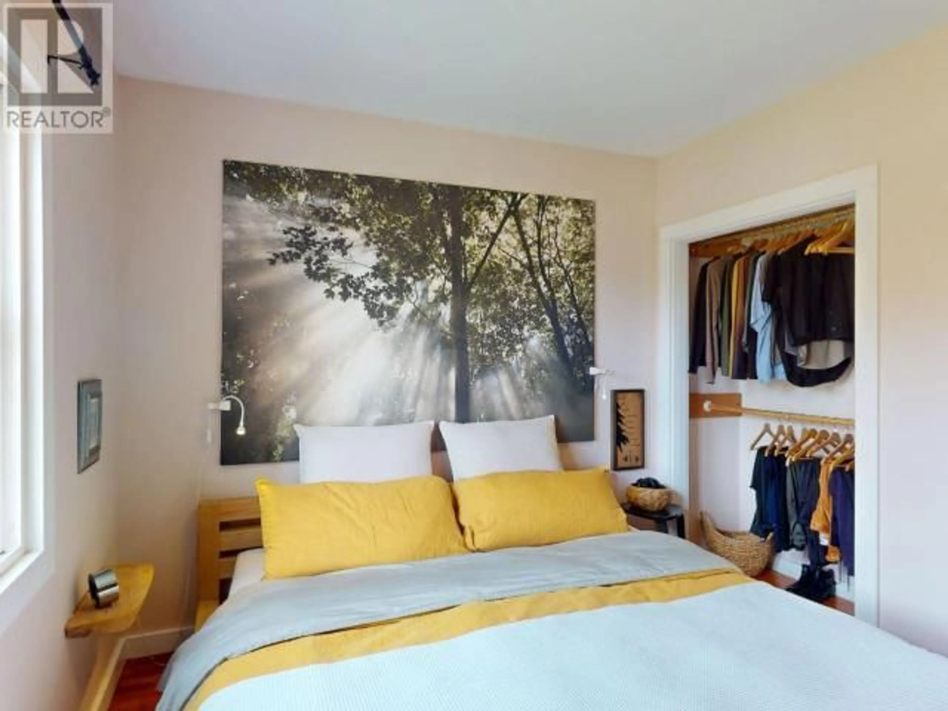 Bedroom with bed, wood/laminate floor for 4594 HARVIE AVE, Powell River British Columbia