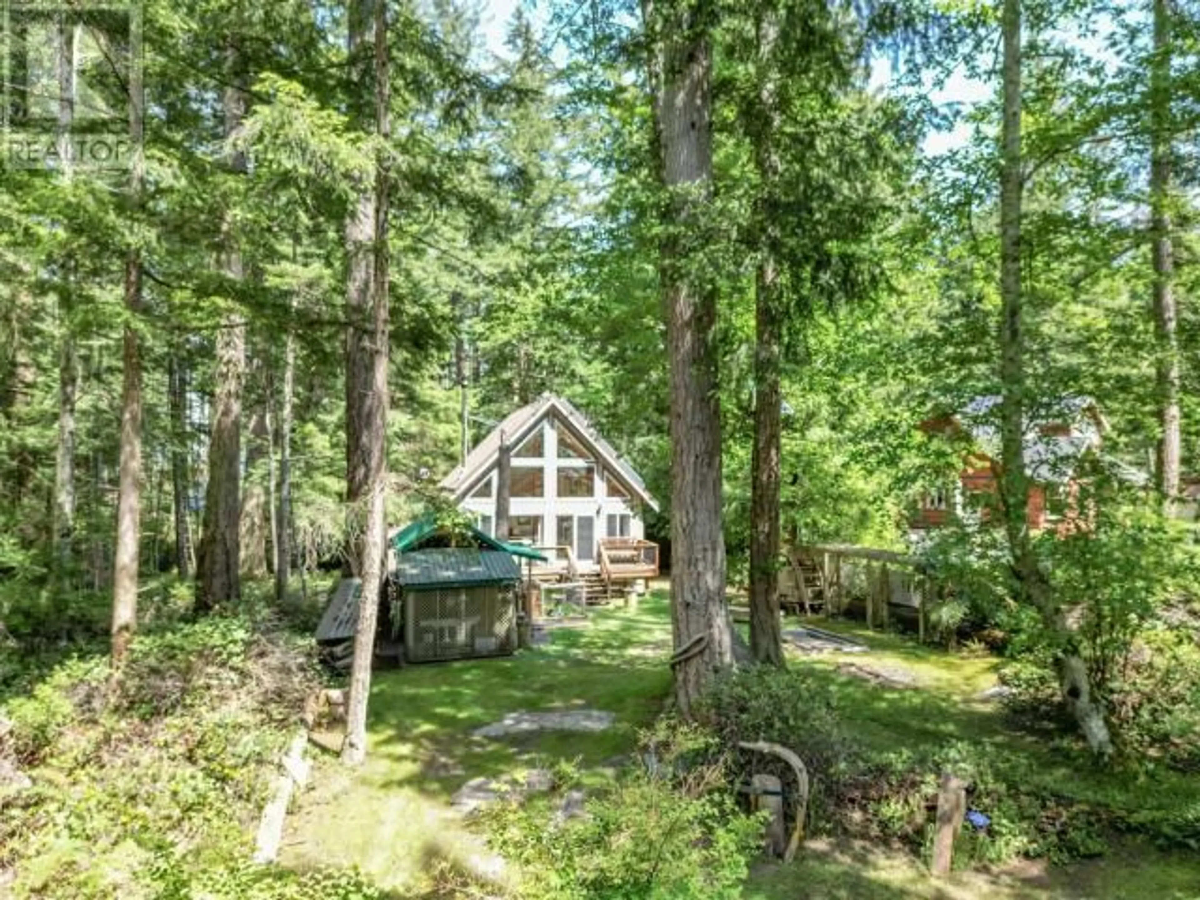 A pic from outside/outdoor area/front of a property/back of a property/a pic from drone, forest/trees view for 1259 VANCOUVER BLVD, Savary Island British Columbia