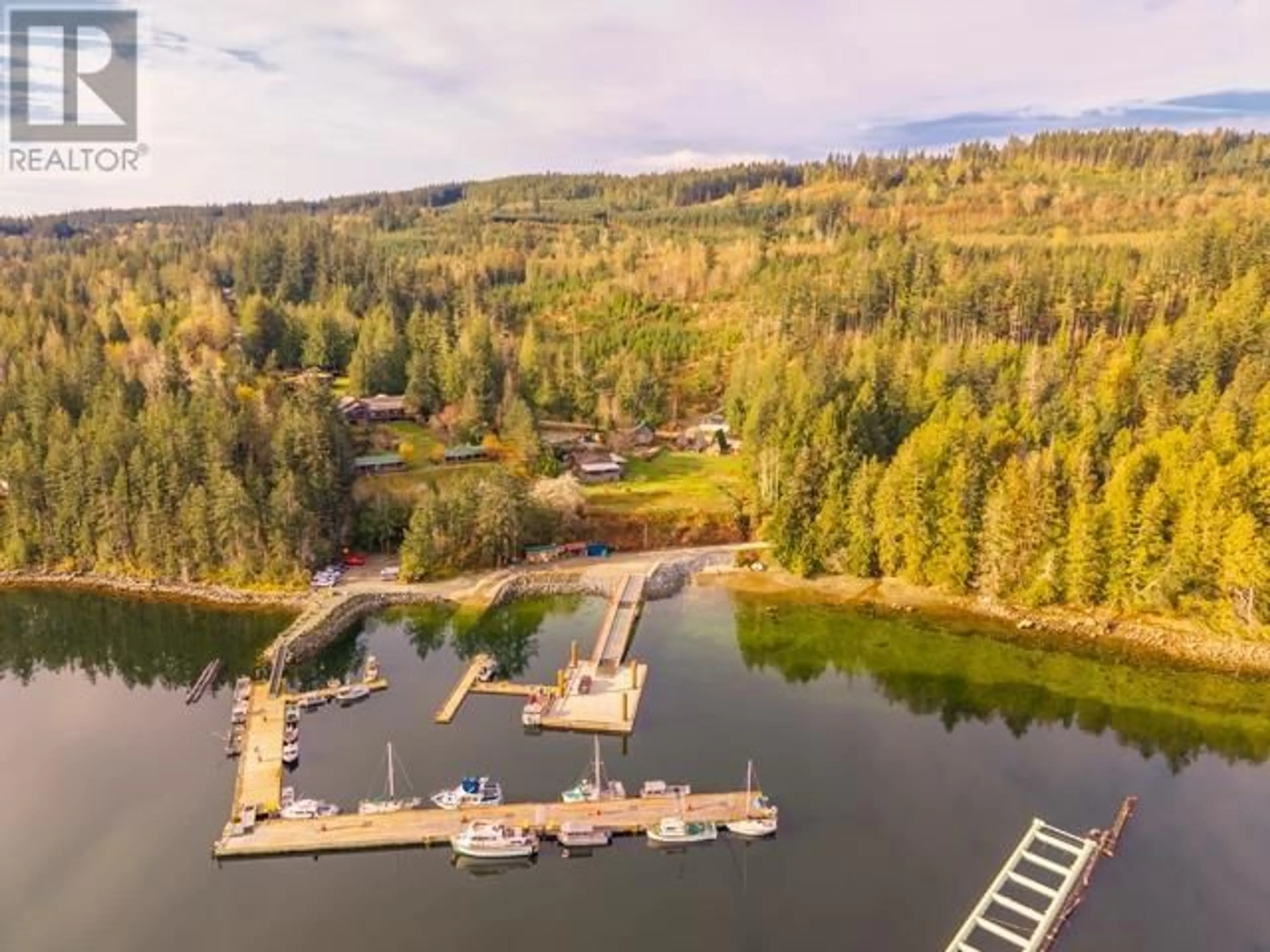 A pic from outside/outdoor area/front of a property/back of a property/a pic from drone, water/lake/river/ocean view for 10052 MALASPINA RD, Powell River British Columbia V8A0G3