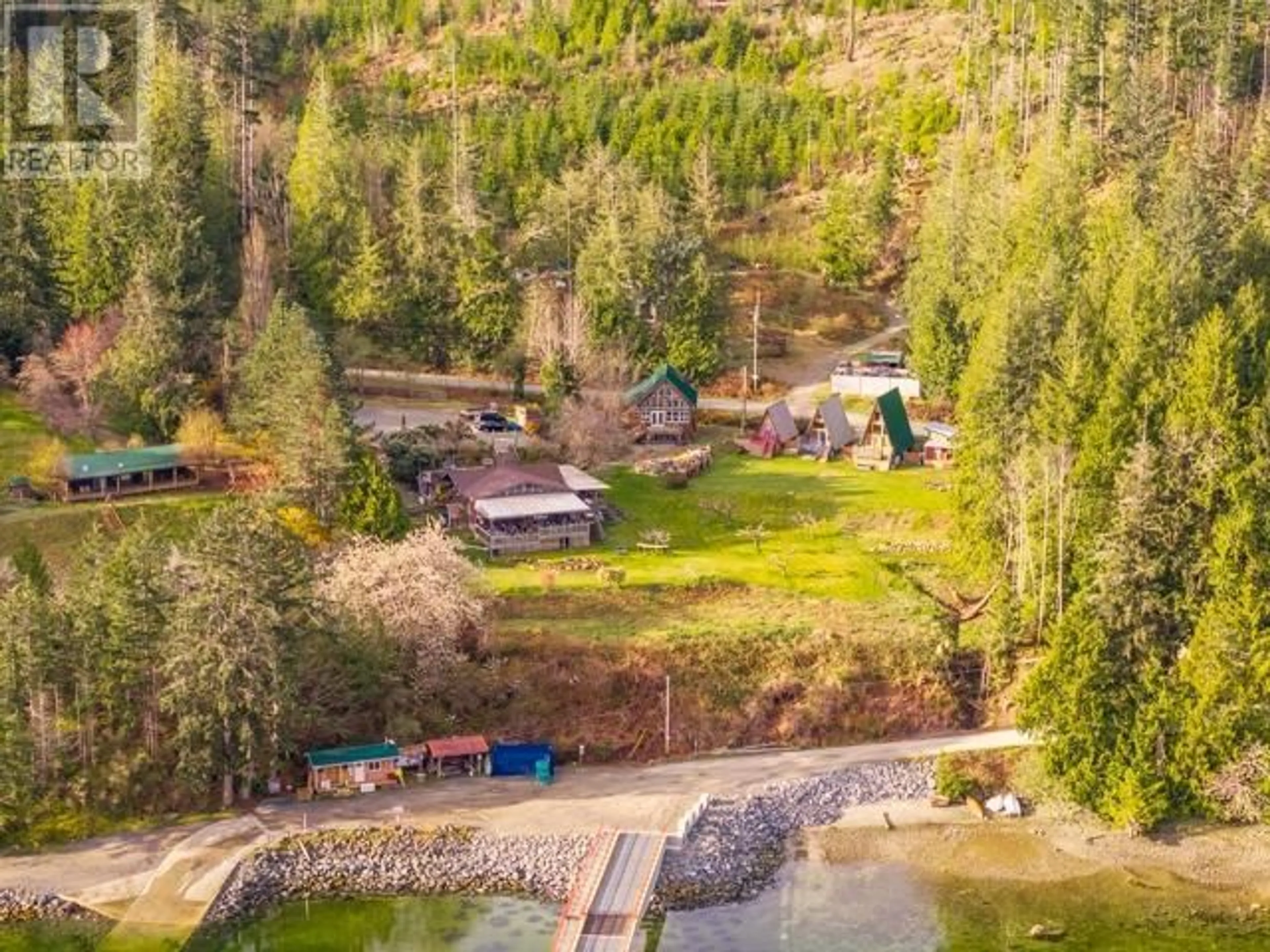 A pic from outside/outdoor area/front of a property/back of a property/a pic from drone, water/lake/river/ocean view for 10052 MALASPINA RD, Powell River British Columbia V8A0G3