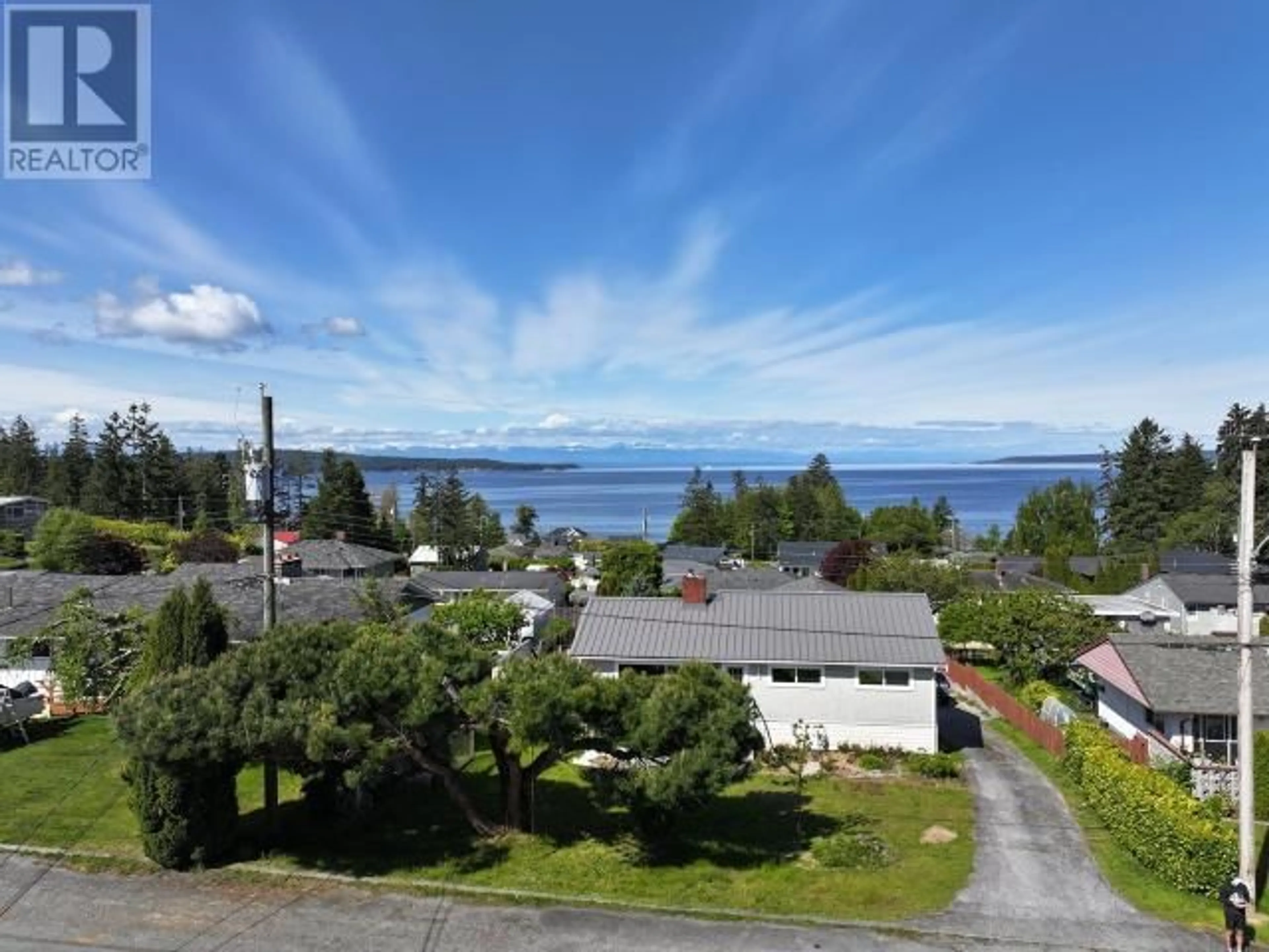 A pic from outside/outdoor area/front of a property/back of a property/a pic from drone, water/lake/river/ocean view for 3616 MANITOBA AVE, Powell River British Columbia