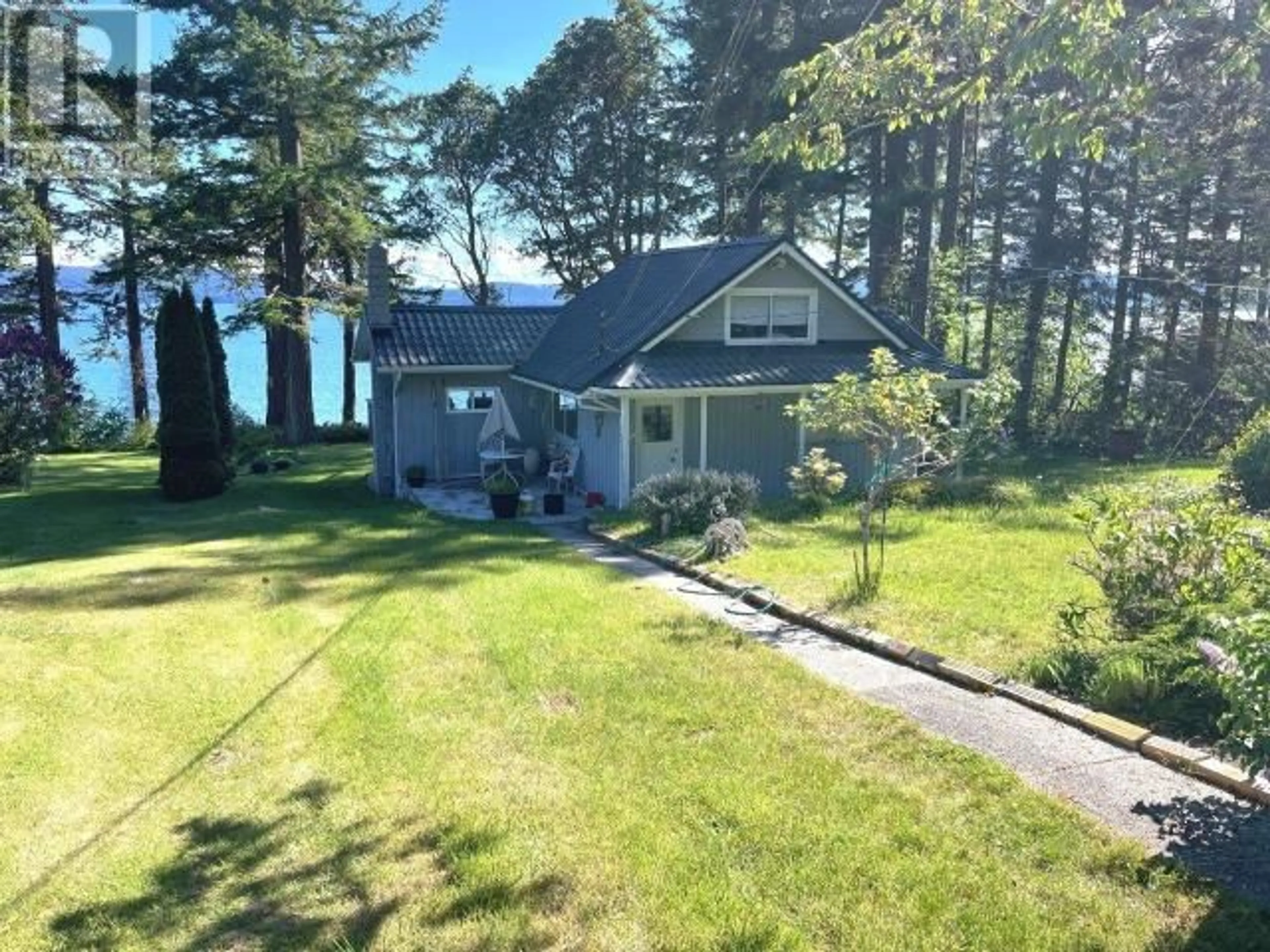 A pic from outside/outdoor area/front of a property/back of a property/a pic from drone, water/lake/river/ocean view for 7647 FATS CRESCENT, Powell River British Columbia