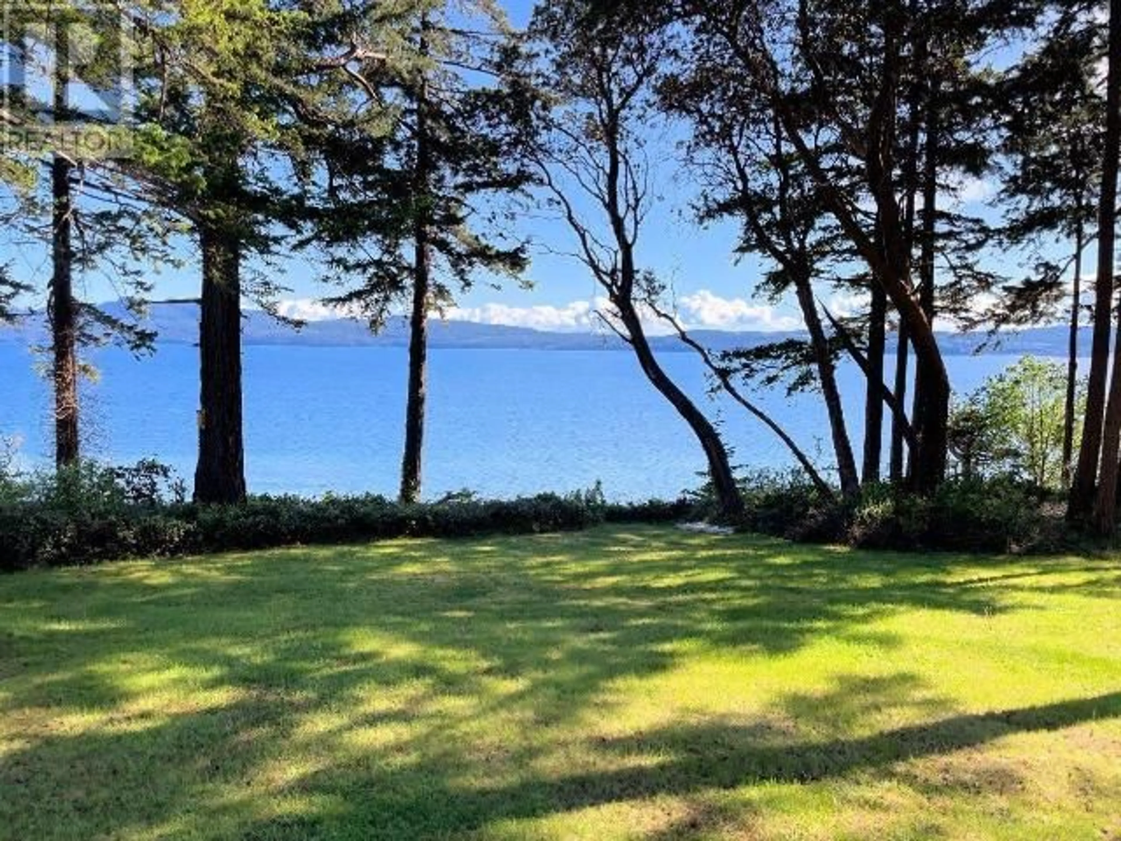 A pic from outside/outdoor area/front of a property/back of a property/a pic from drone, water/lake/river/ocean view for 7647 FATS CRESCENT, Powell River British Columbia