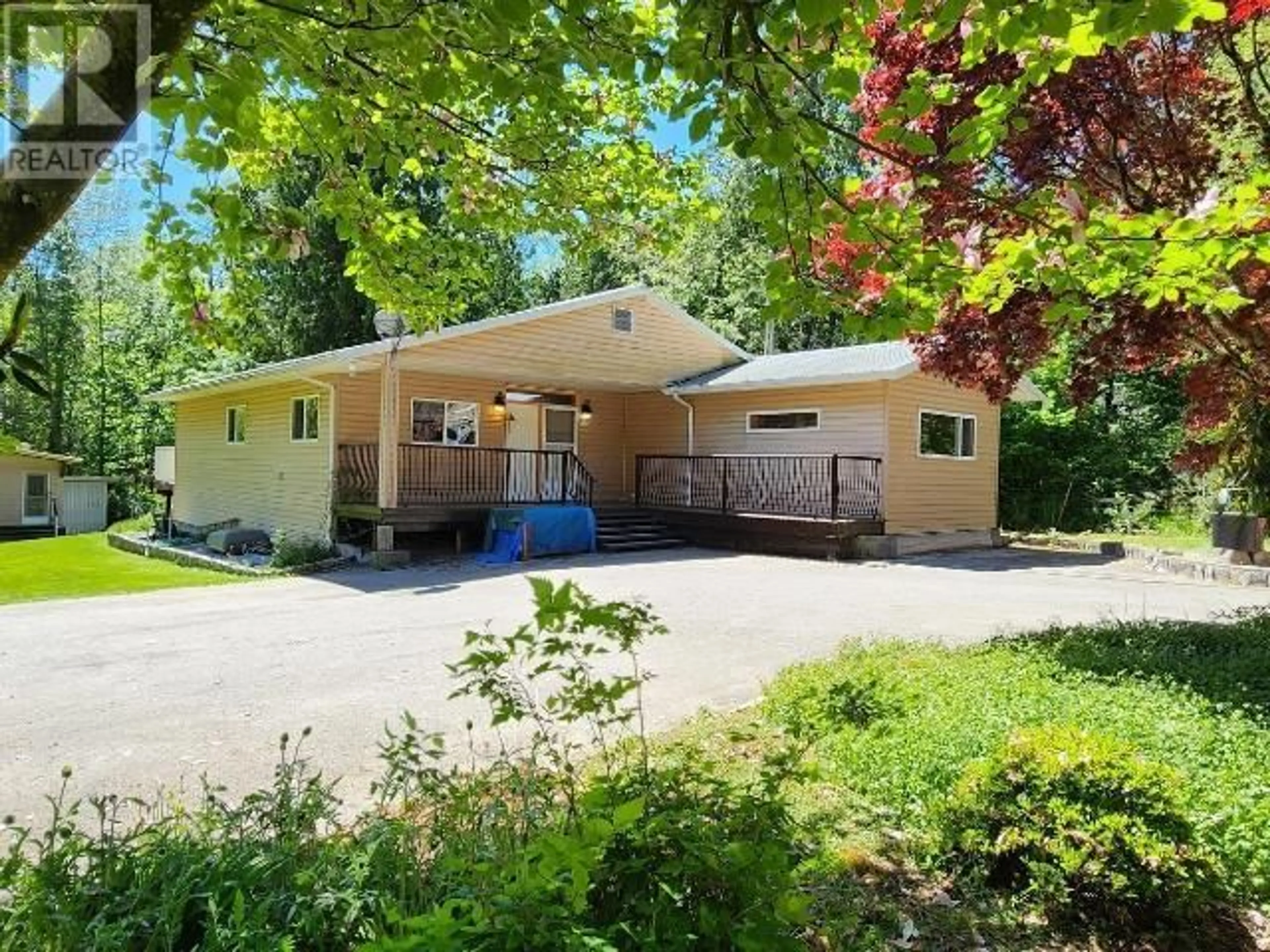 A pic from outside/outdoor area/front of a property/back of a property/a pic from drone, street for 10187 HIGHWAY 101, Powell River British Columbia