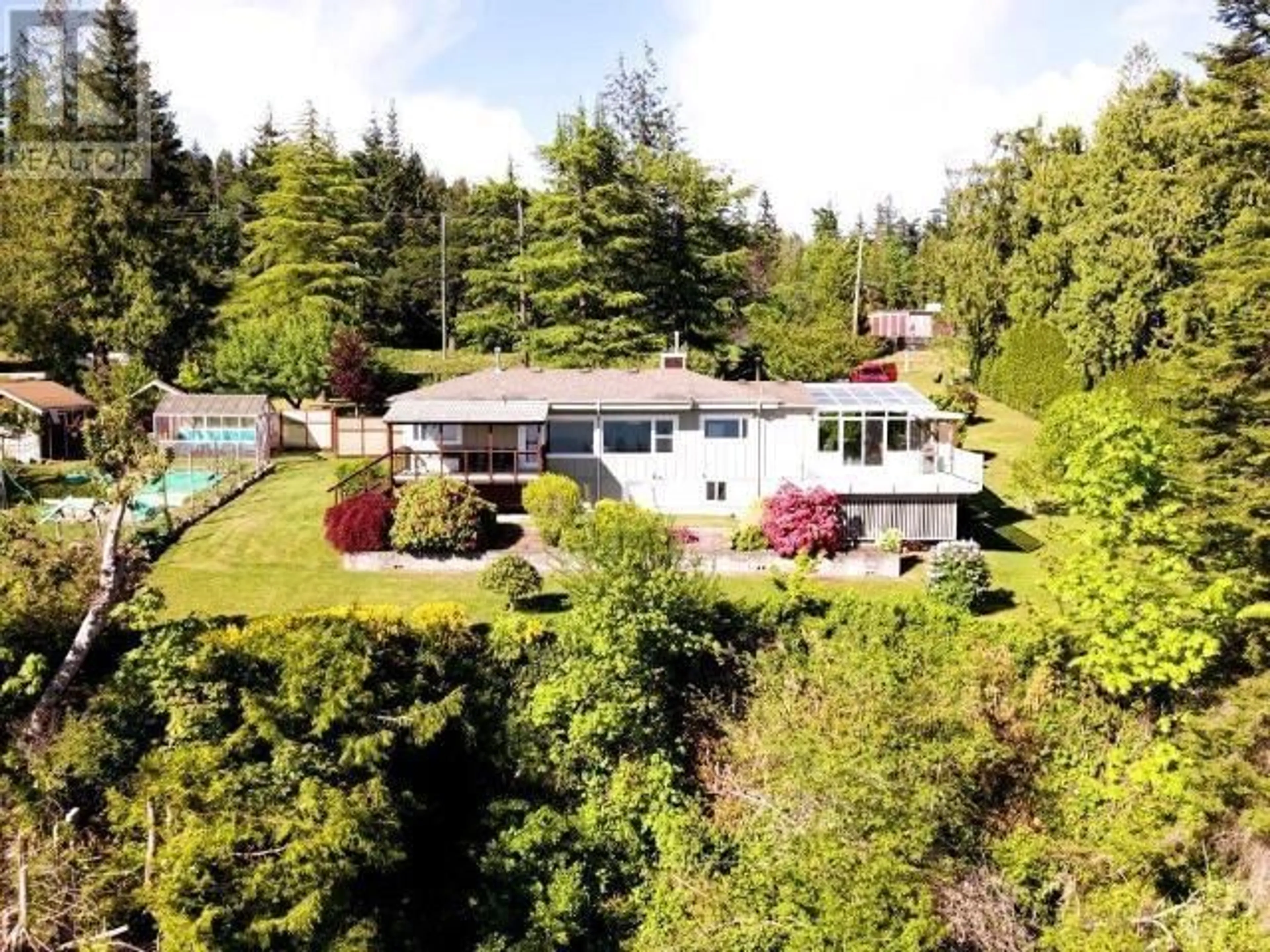 A pic from outside/outdoor area/front of a property/back of a property/a pic from drone, mountain view for 7457 HIGHWAY 101, Powell River British Columbia