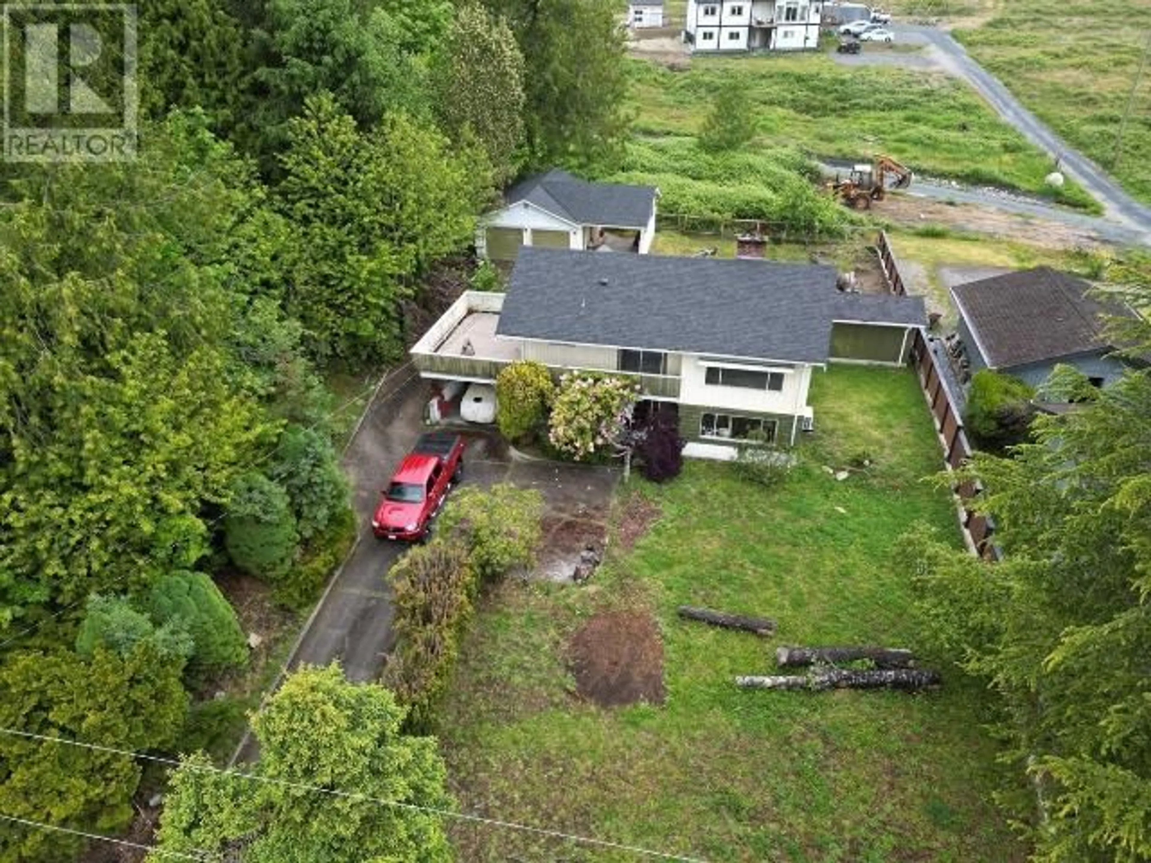 A pic from outside/outdoor area/front of a property/back of a property/a pic from drone, street for 8140 CENTENNIAL DRIVE, Powell River British Columbia