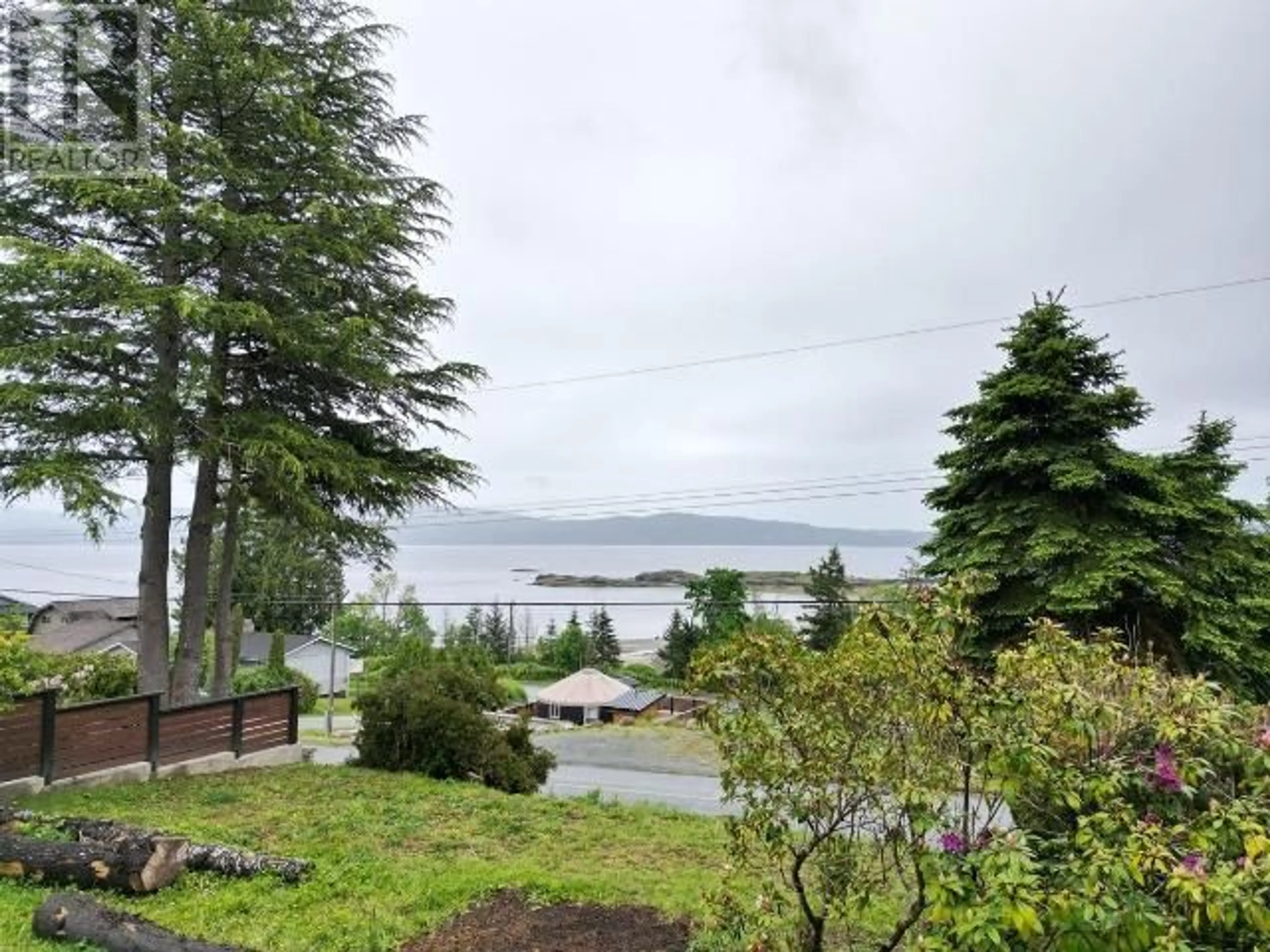 A pic from outside/outdoor area/front of a property/back of a property/a pic from drone, water/lake/river/ocean view for 8140 CENTENNIAL DRIVE, Powell River British Columbia