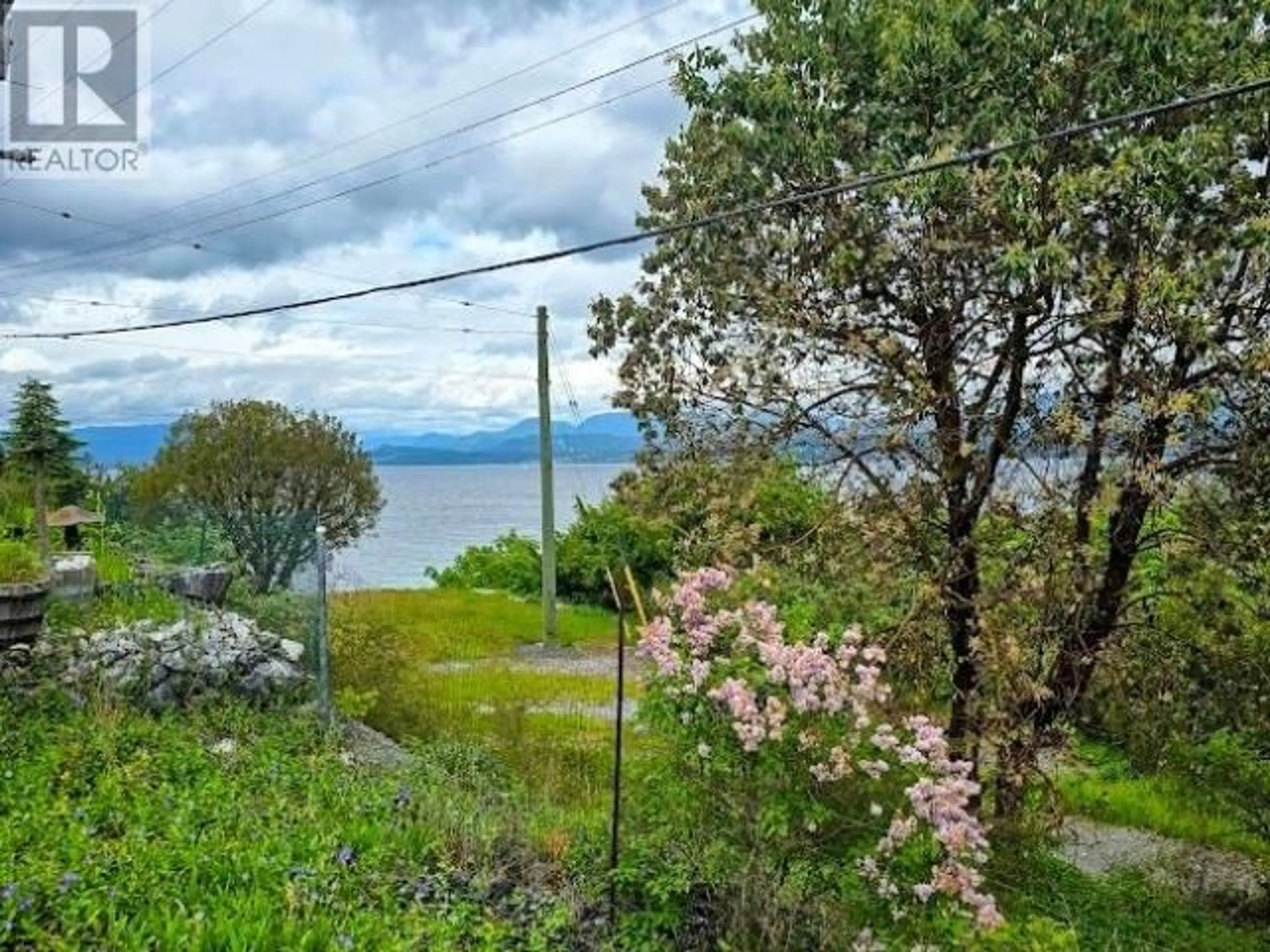 A pic from outside/outdoor area/front of a property/back of a property/a pic from drone, water/lake/river/ocean view for 5180 PARA STREET, Texada Island British Columbia