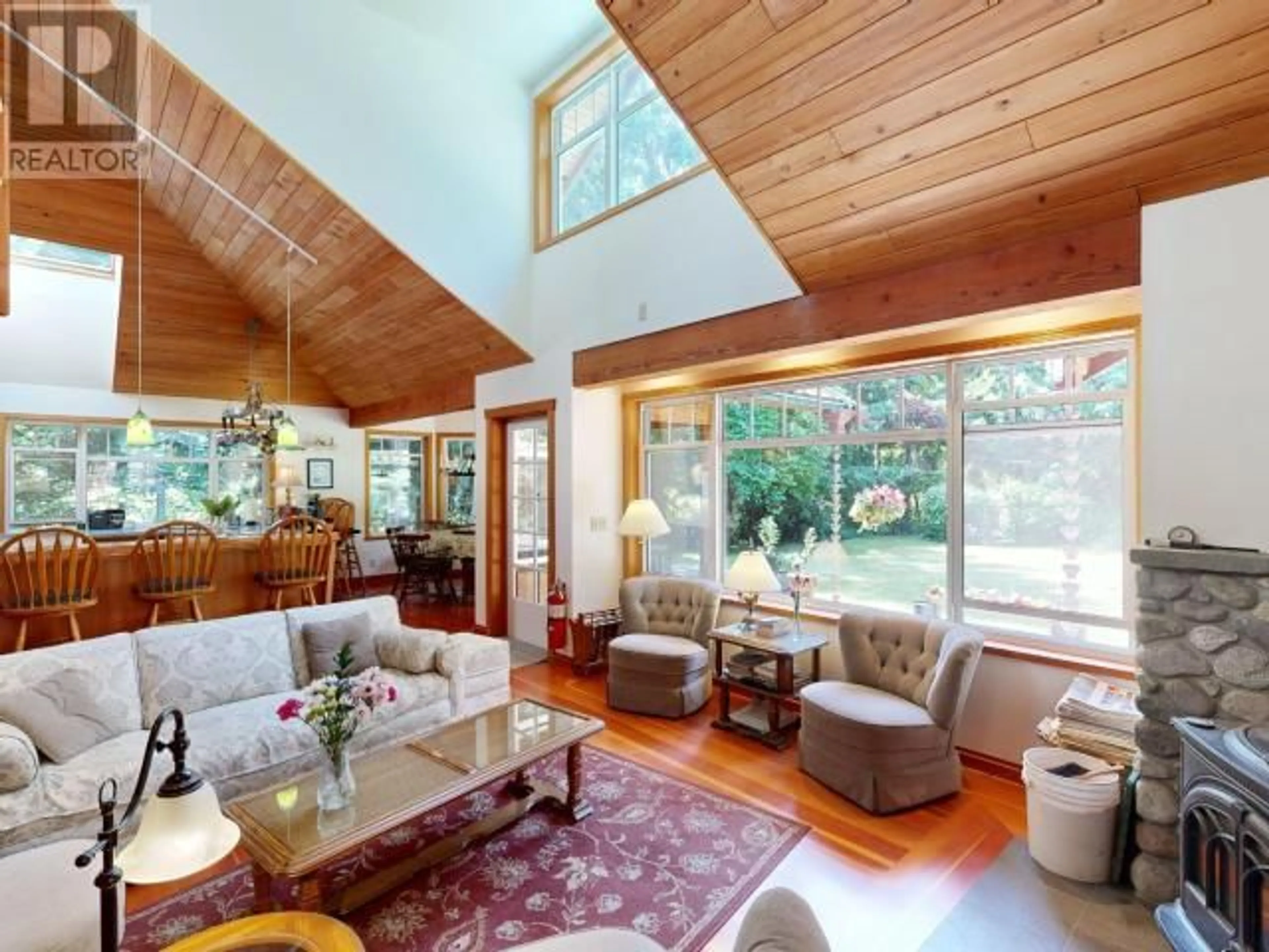 Living room with furniture, wood/laminate floor for 2777 CEDAR WAY, Savary Island British Columbia V0N2G0