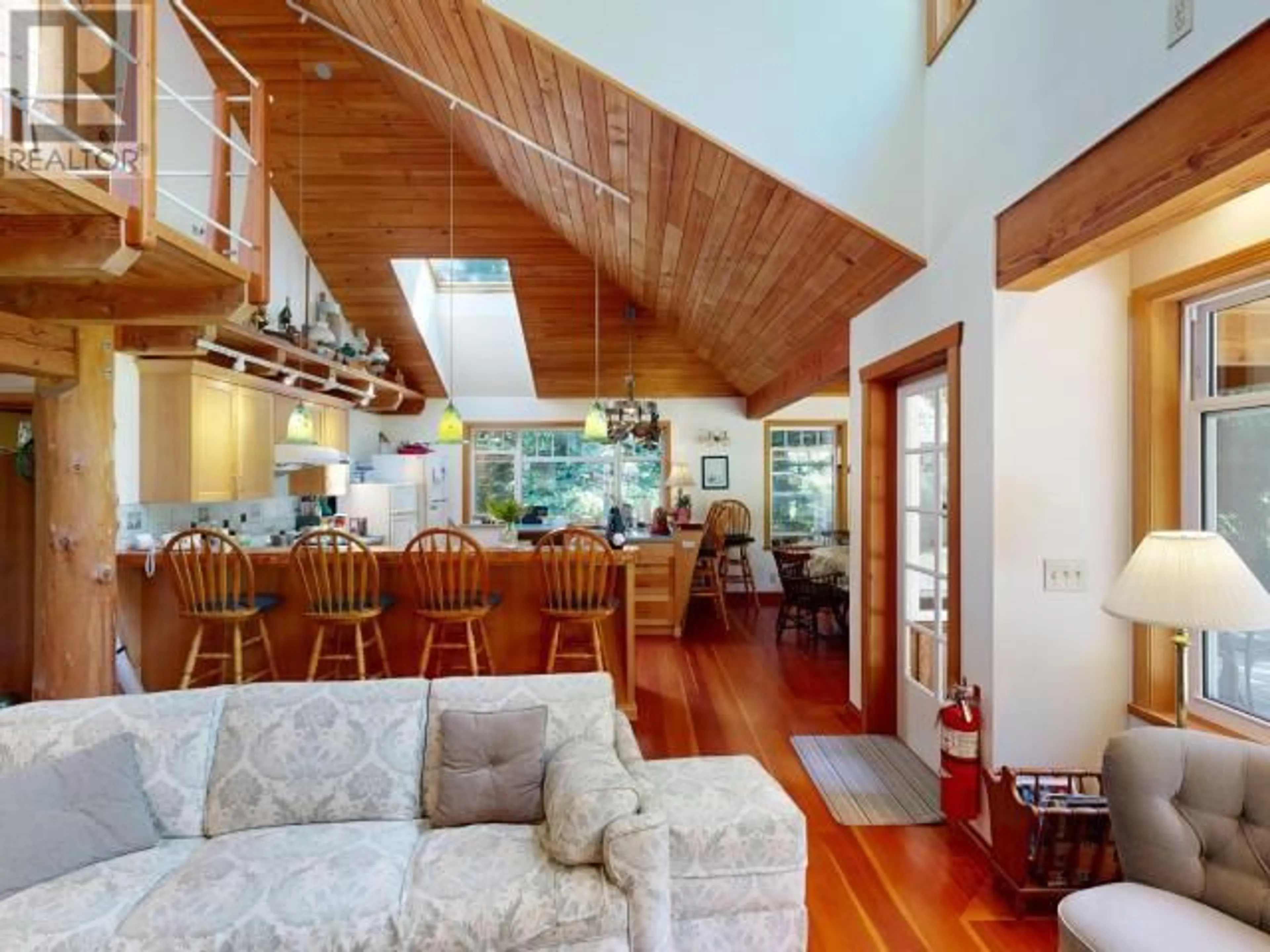 Open concept kitchen, wood/laminate floor for 2777 CEDAR WAY, Savary Island British Columbia V0N2G0