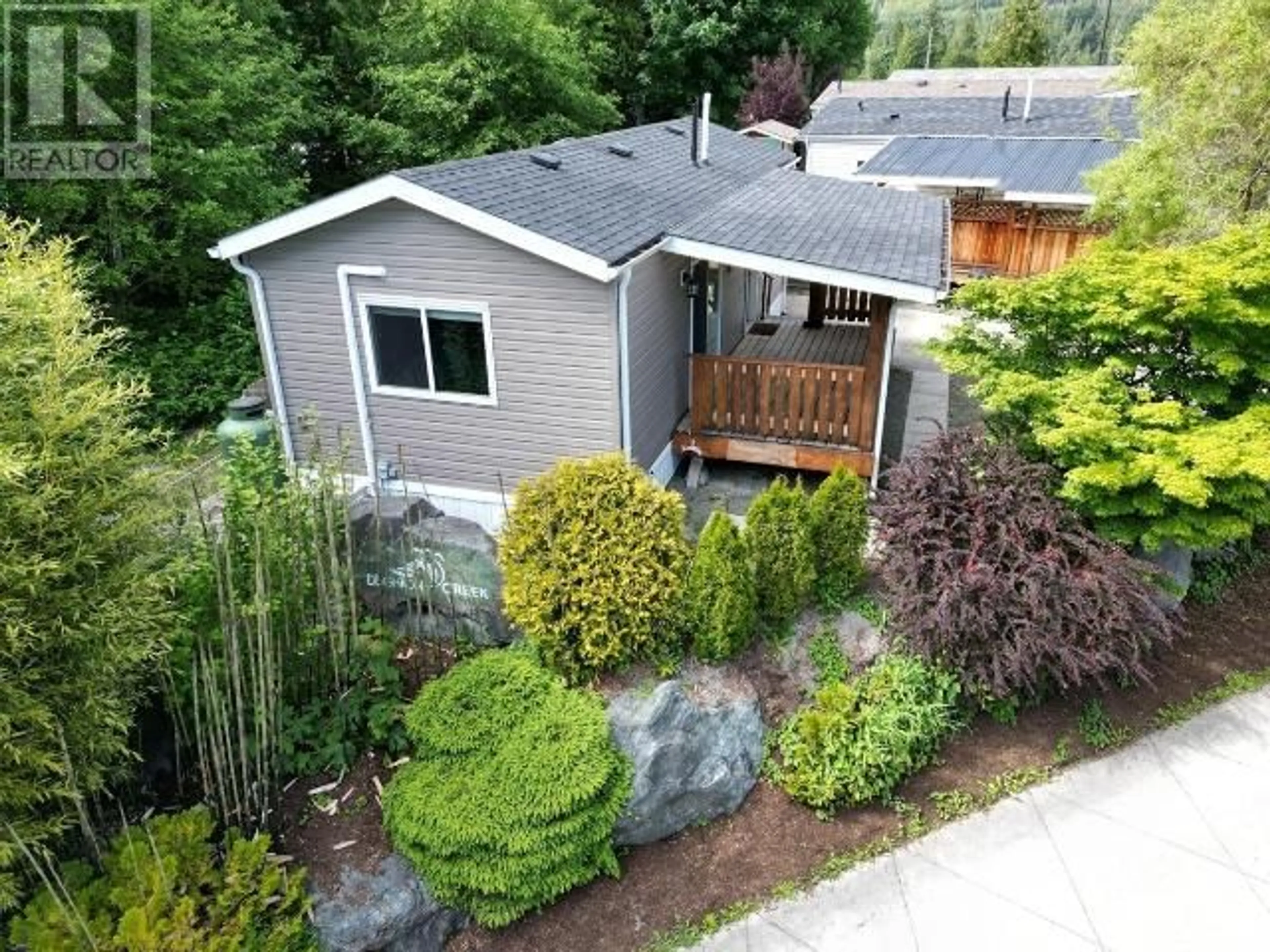 A pic from outside/outdoor area/front of a property/back of a property/a pic from drone, street for 100 SPRINGBROOK ROAD, Powell River British Columbia V8A0S3