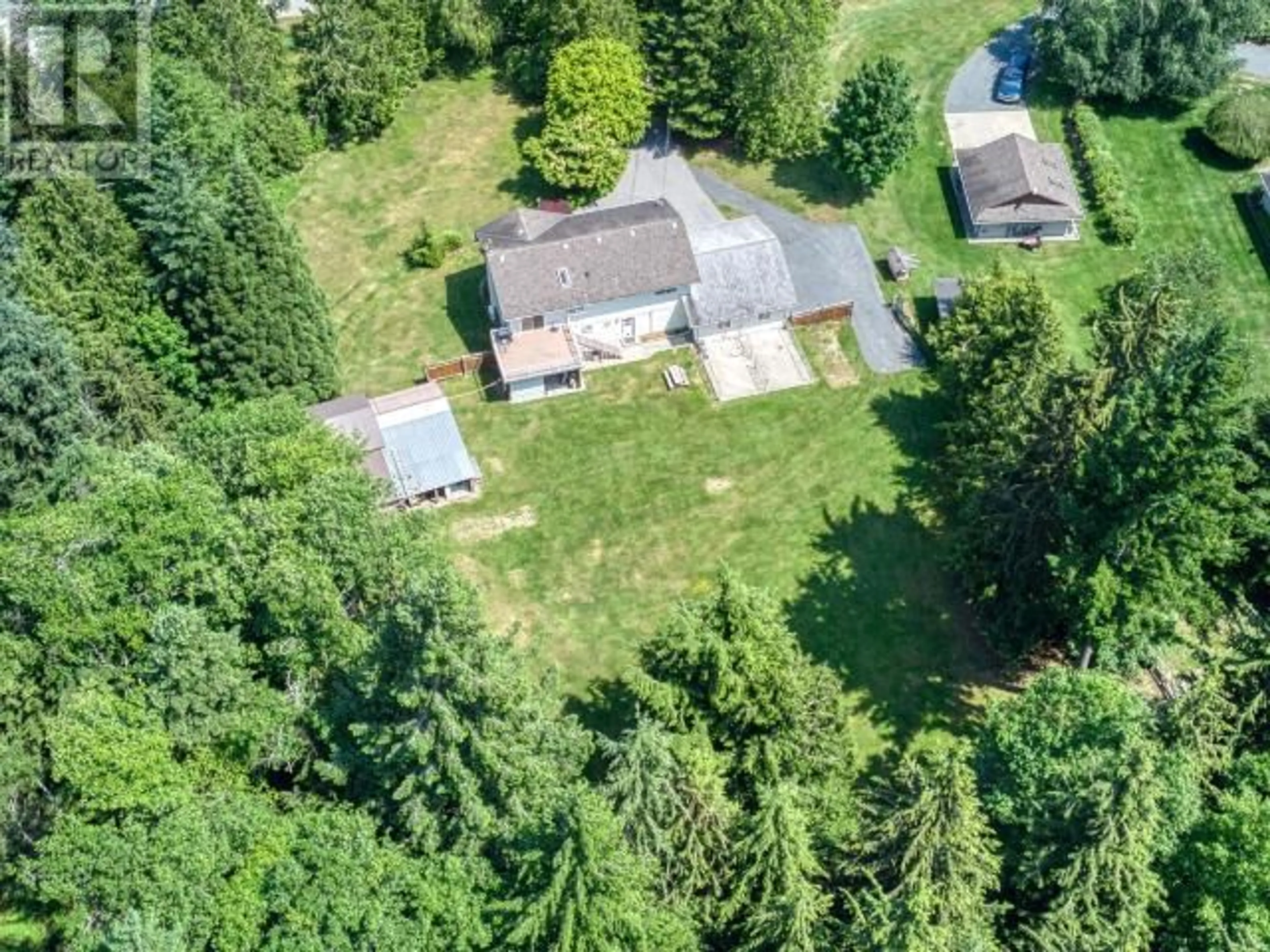 A pic from outside/outdoor area/front of a property/back of a property/a pic from drone, forest/trees view for 104 - 3231 BYRON ROAD, Powell River British Columbia V8A0R8