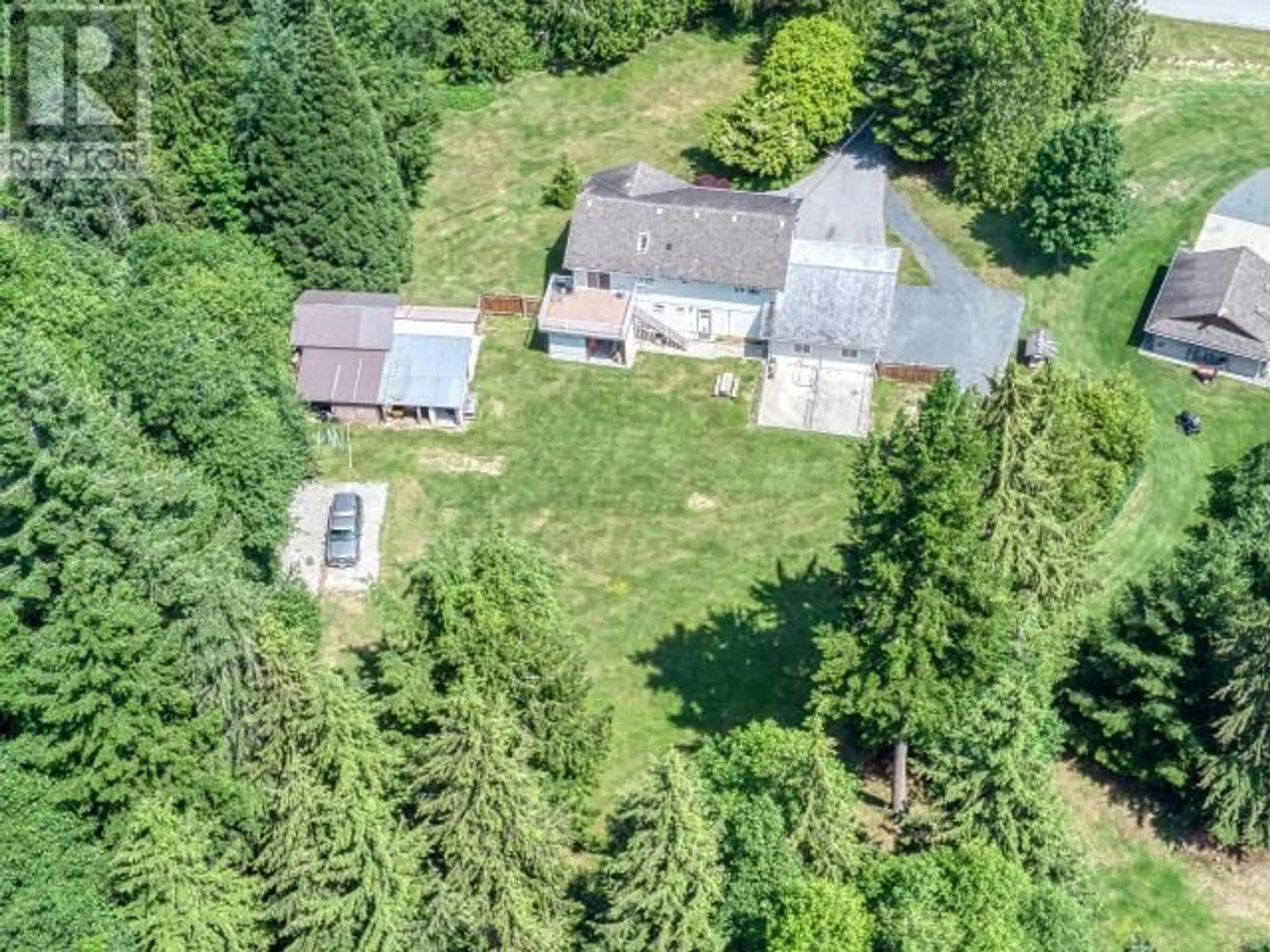 A pic from outside/outdoor area/front of a property/back of a property/a pic from drone, forest/trees view for 104 - 3231 BYRON ROAD, Powell River British Columbia V8A0R8