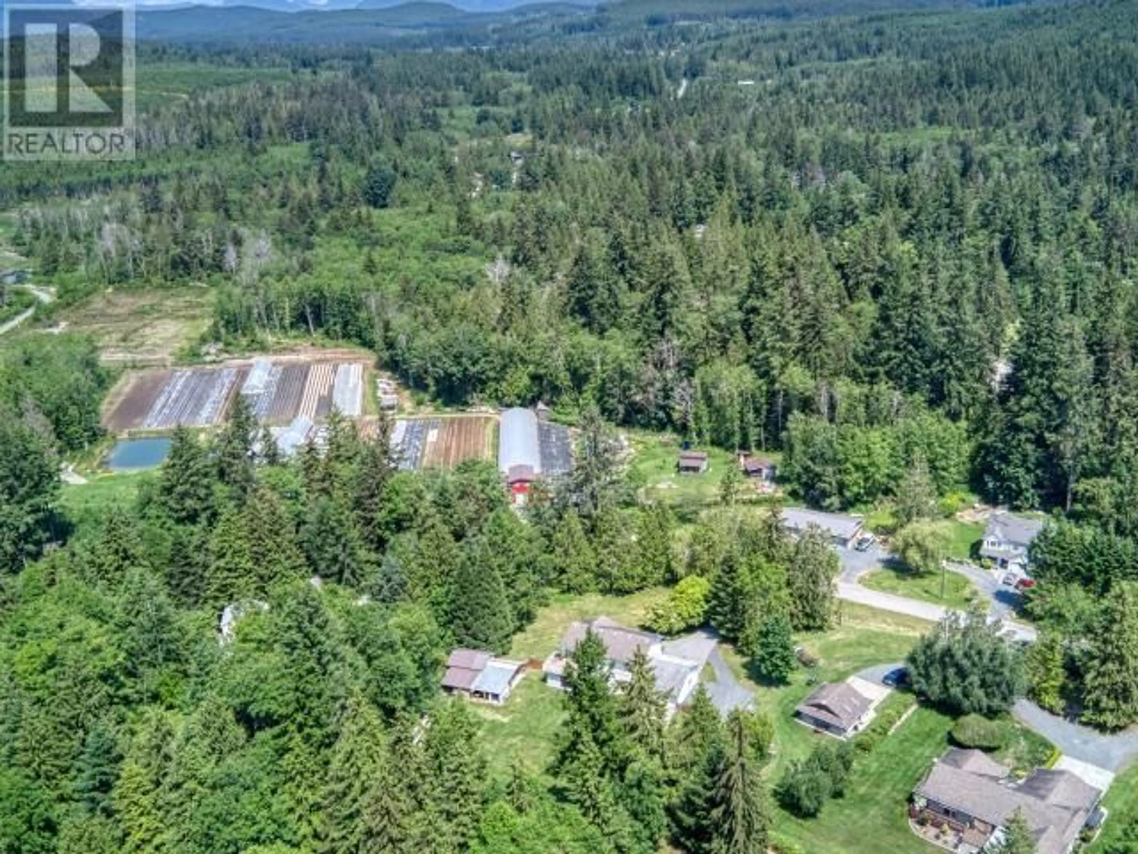 A pic from outside/outdoor area/front of a property/back of a property/a pic from drone, forest/trees view for 104 - 3231 BYRON ROAD, Powell River British Columbia V8A0R8