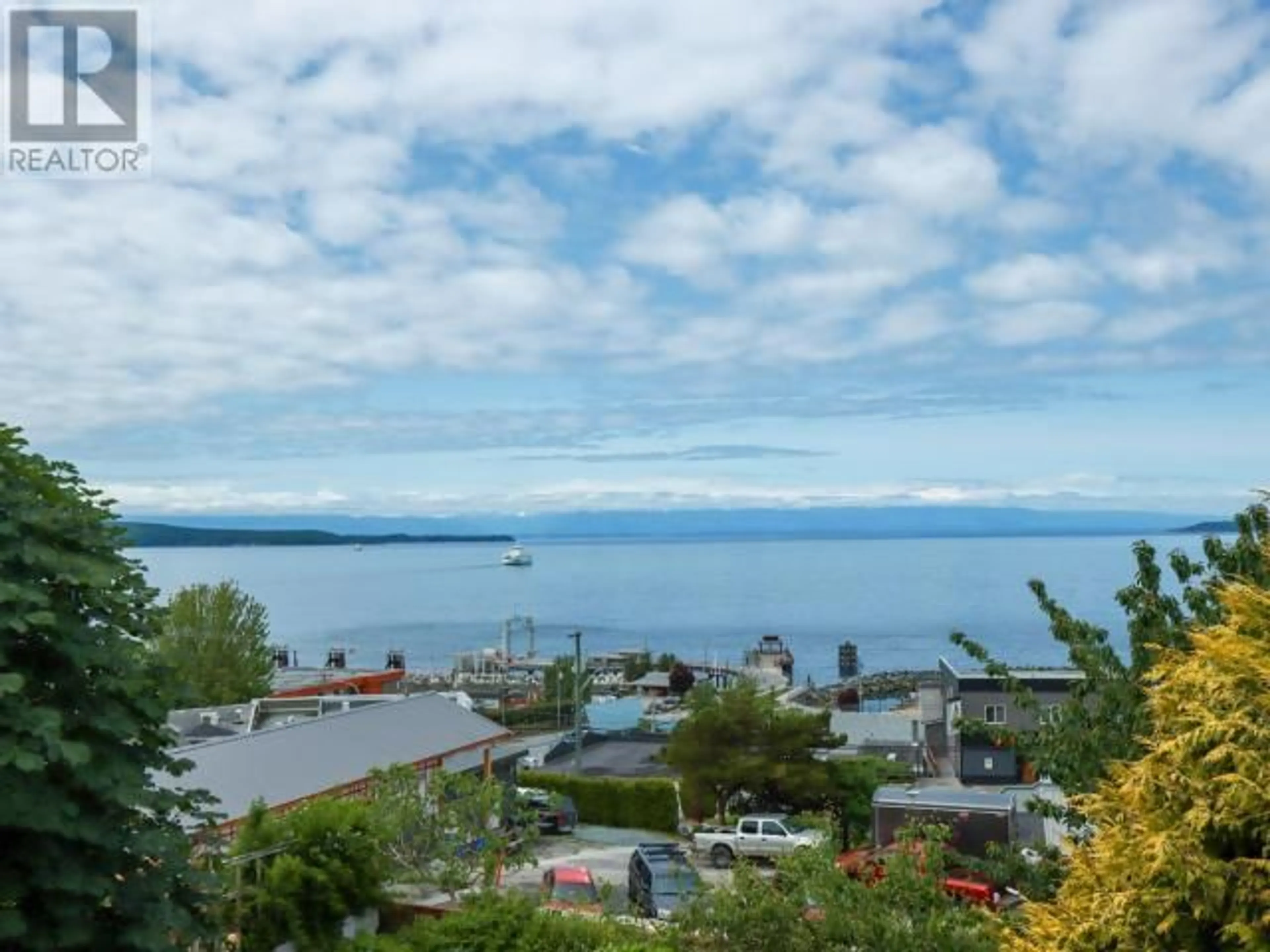 A pic from outside/outdoor area/front of a property/back of a property/a pic from drone, water/lake/river/ocean view for 4467 OMINECA AVE, Powell River British Columbia V8A2P8