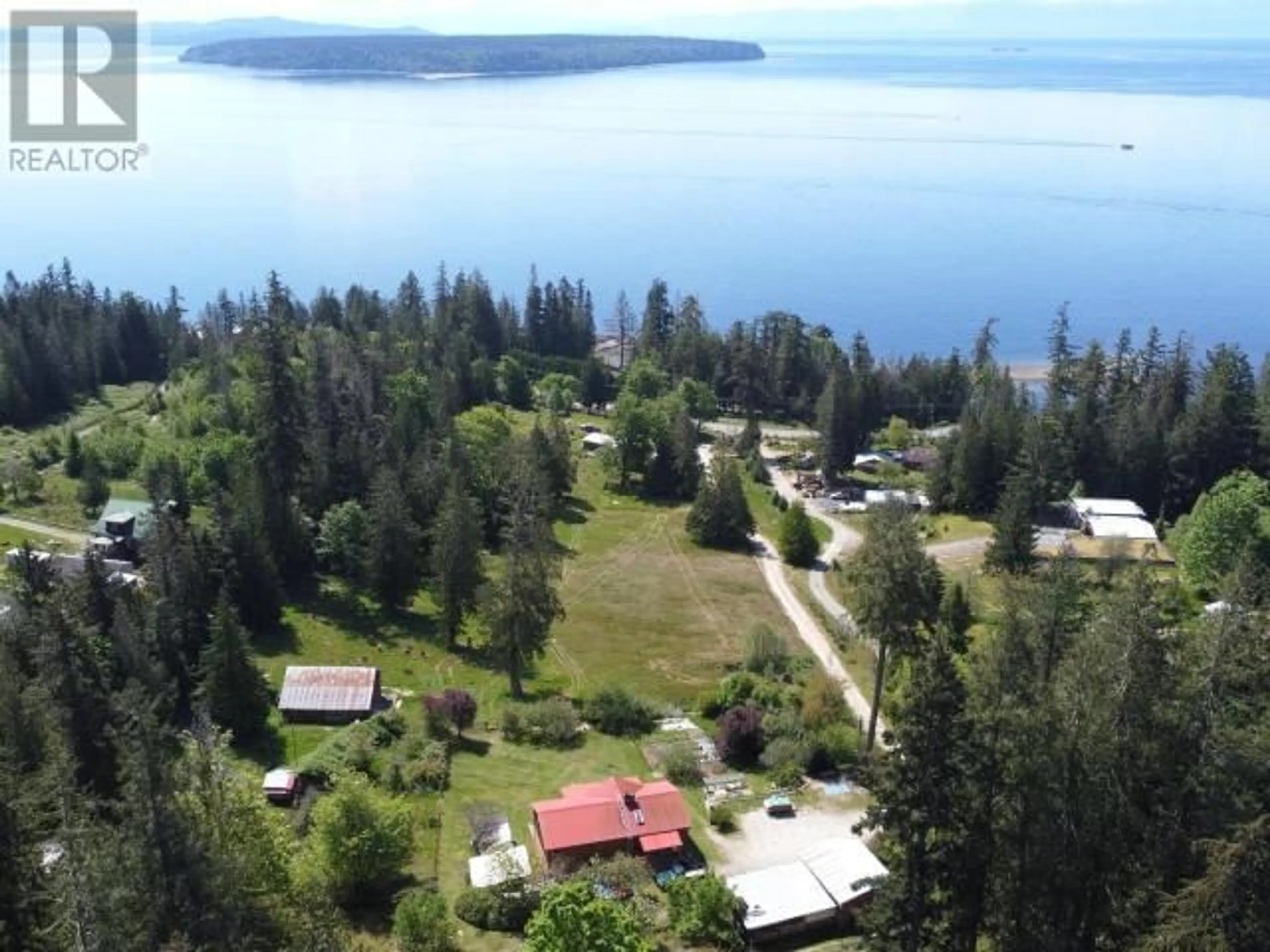 A pic from outside/outdoor area/front of a property/back of a property/a pic from drone, water/lake/river/ocean view for 3872 HIGHWAY 101, Powell River British Columbia V8A0C6