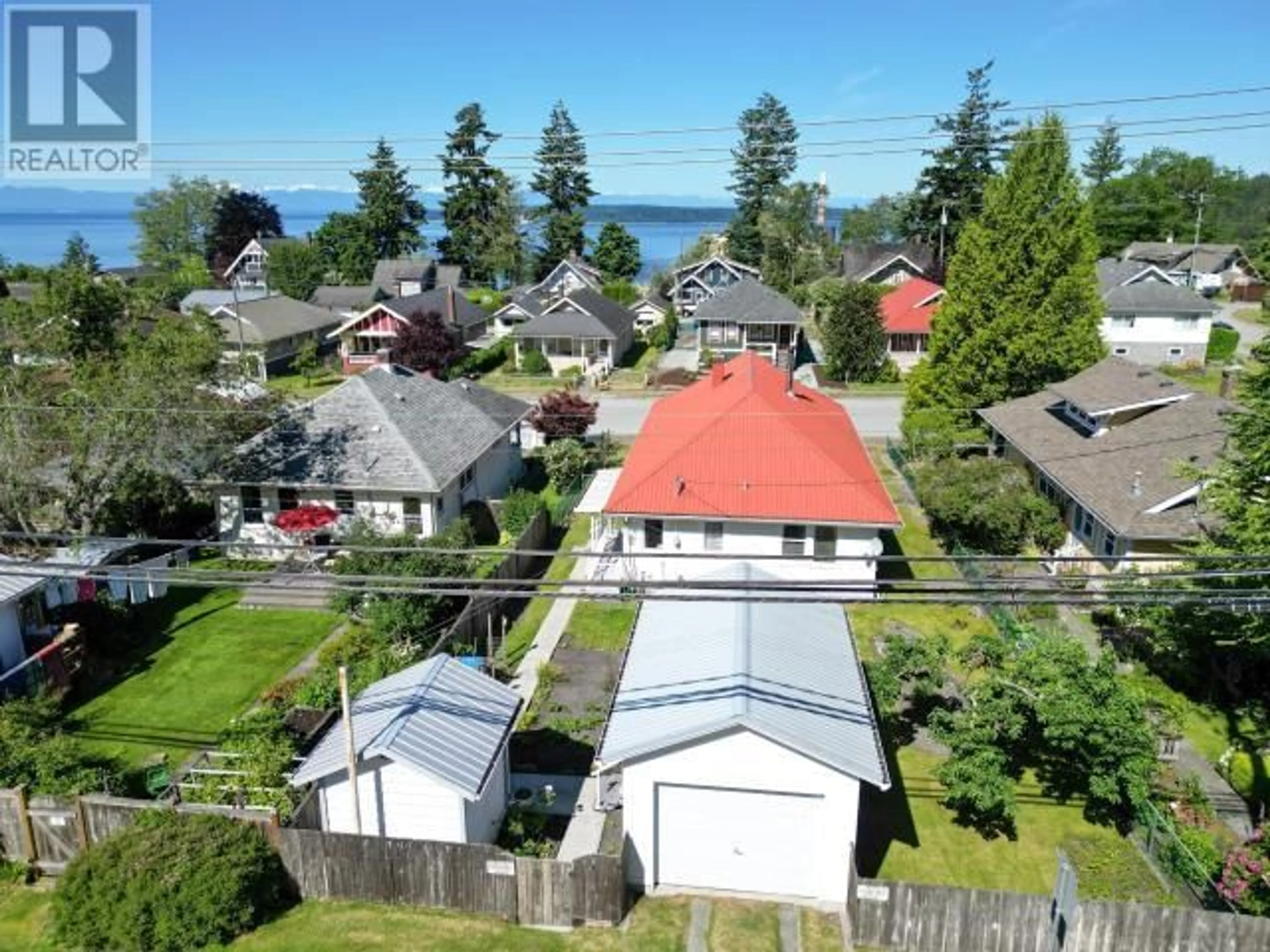 A pic from outside/outdoor area/front of a property/back of a property/a pic from drone, water/lake/river/ocean view for 5772 MAPLE AVE, Powell River British Columbia