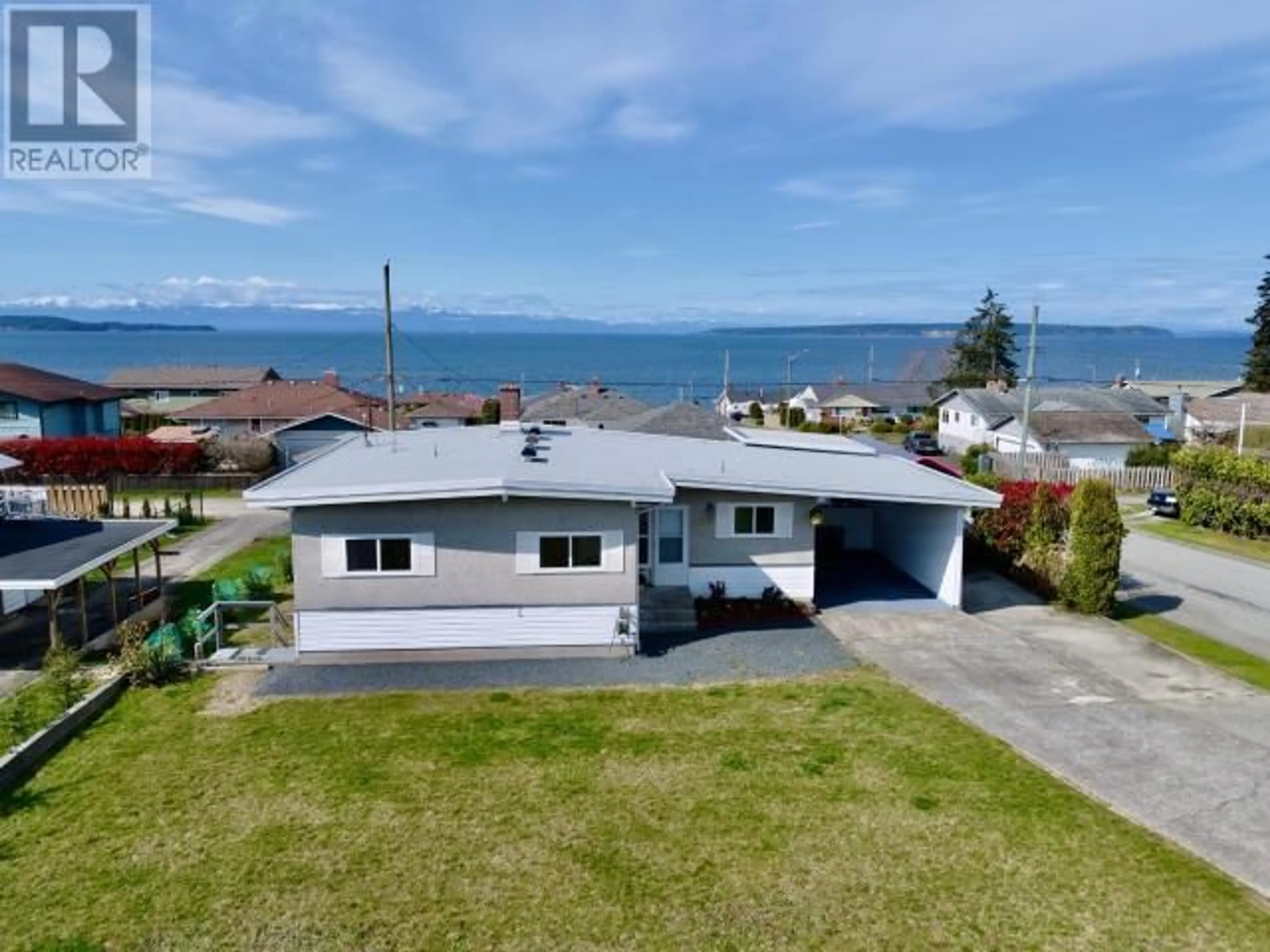 A pic from outside/outdoor area/front of a property/back of a property/a pic from drone, water/lake/river/ocean view for 4069 GORDON AVE, Powell River British Columbia