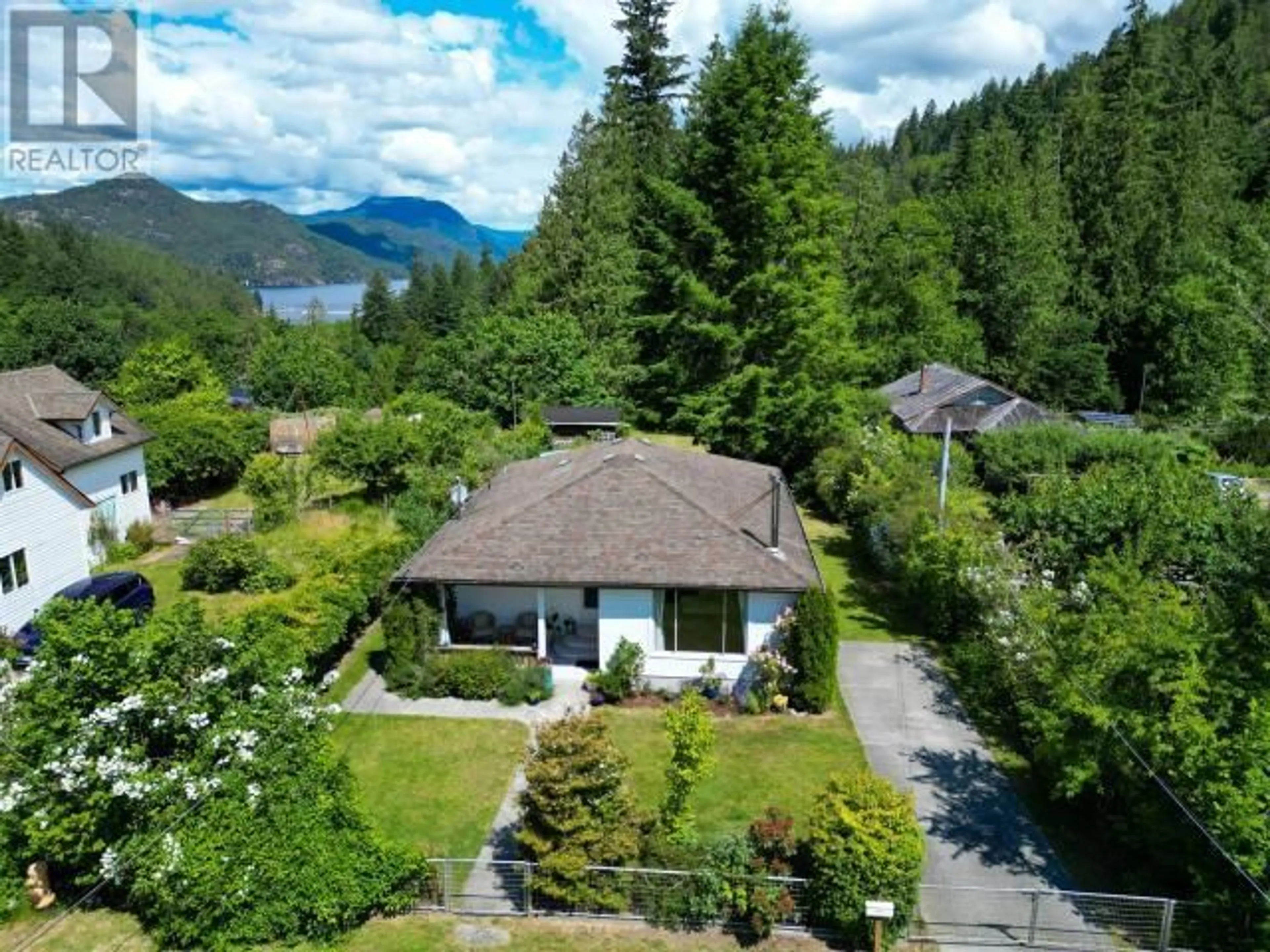 A pic from outside/outdoor area/front of a property/back of a property/a pic from drone, mountain view for 6907 COBURN STREET, Powell River British Columbia V8A4A6