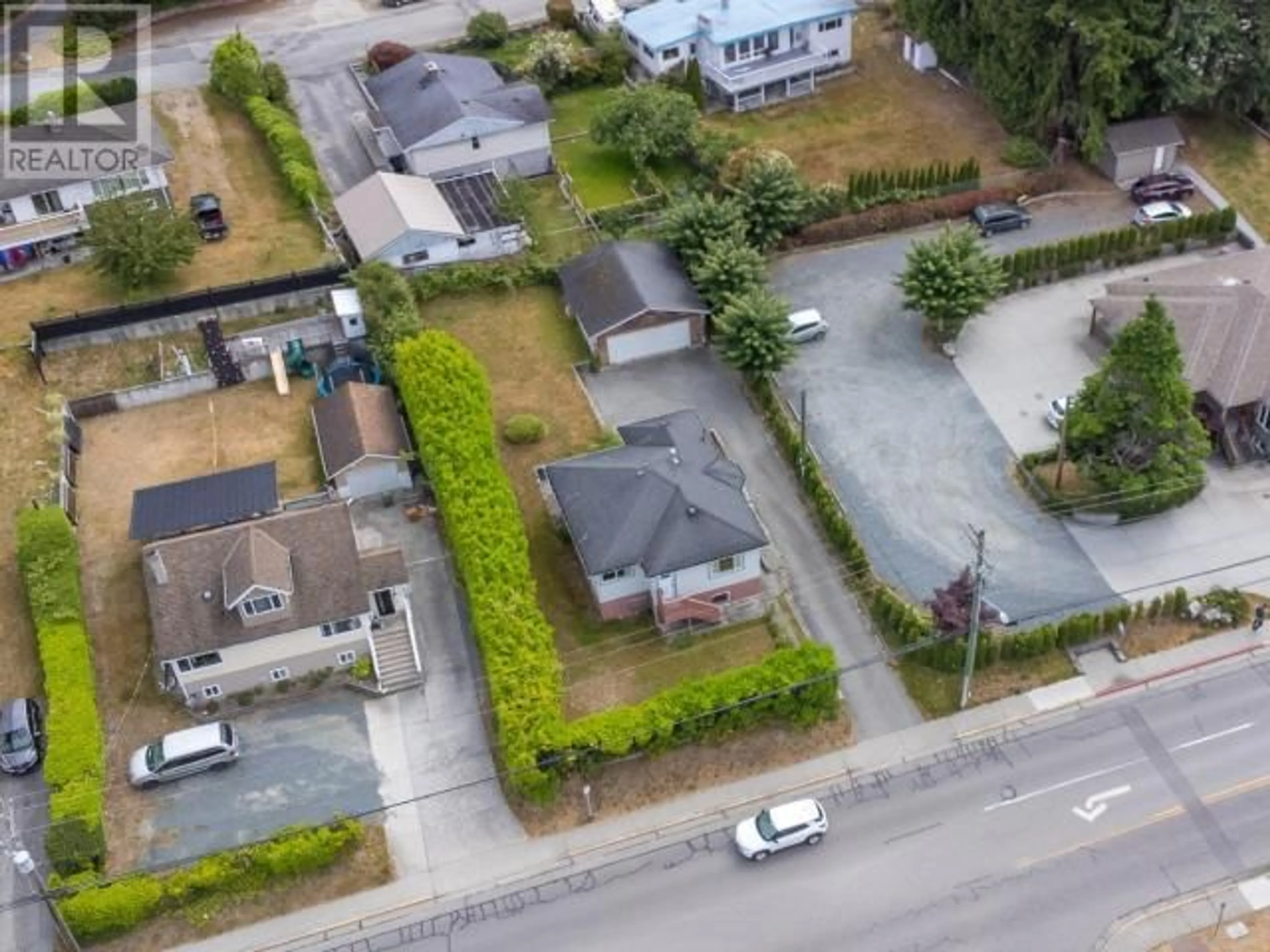 A pic from outside/outdoor area/front of a property/back of a property/a pic from drone, street for 4844 JOYCE AVE, Powell River British Columbia