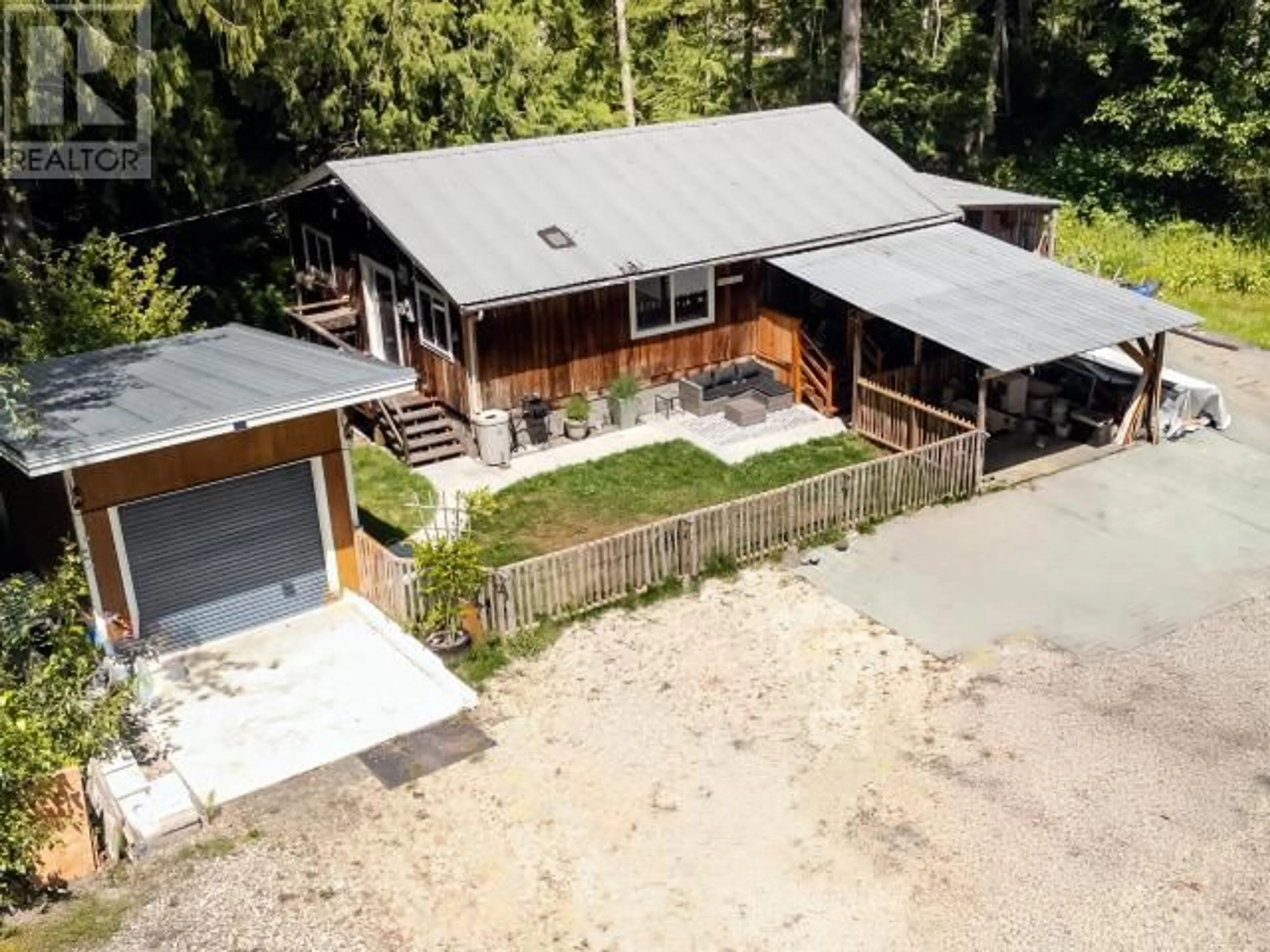 A pic from outside/outdoor area/front of a property/back of a property/a pic from drone, street for 3462 HIGHWAY 101, Powell River British Columbia V8A0E4