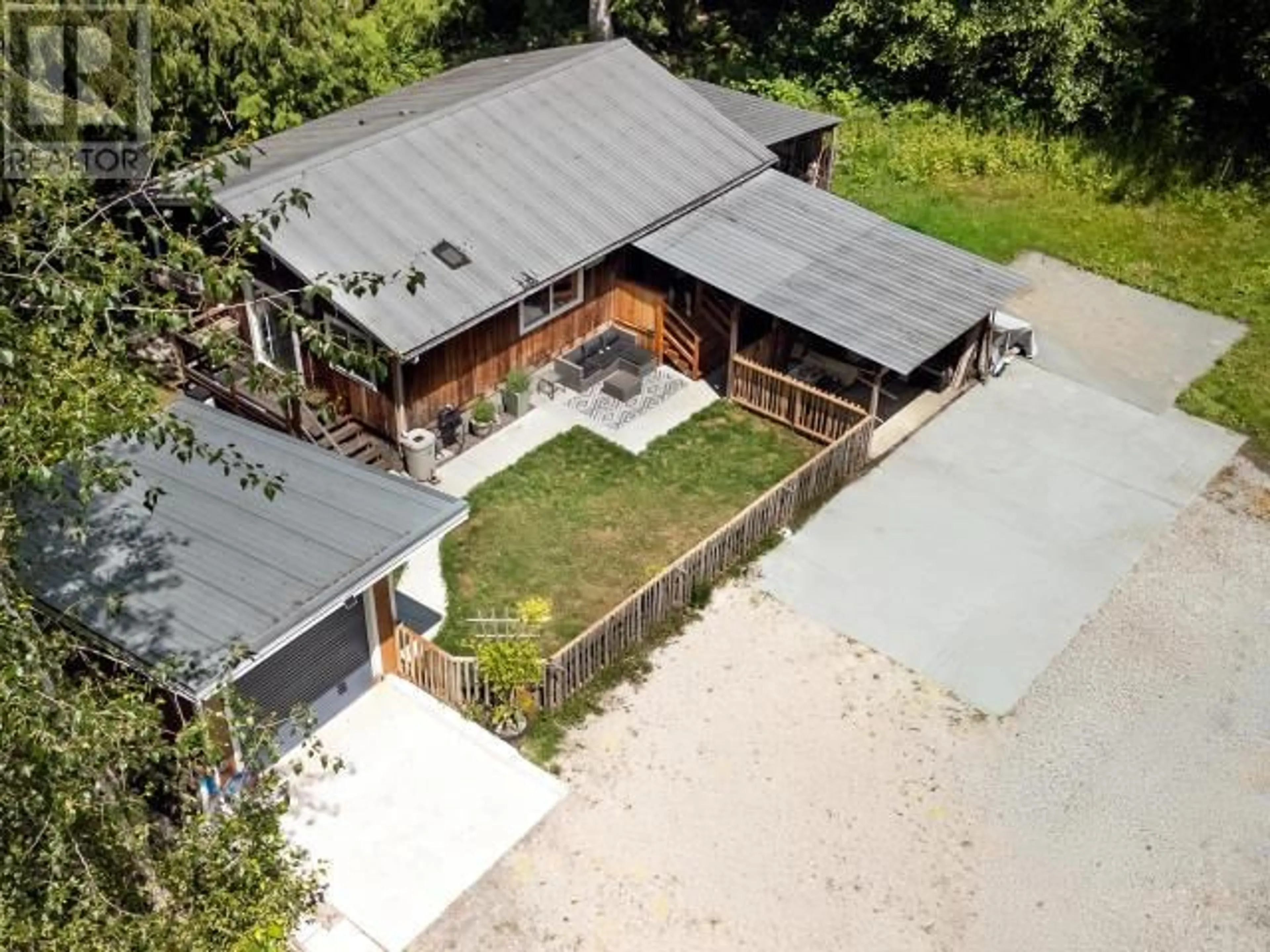 A pic from outside/outdoor area/front of a property/back of a property/a pic from drone, building for 3462 HIGHWAY 101, Powell River British Columbia V8A0E4