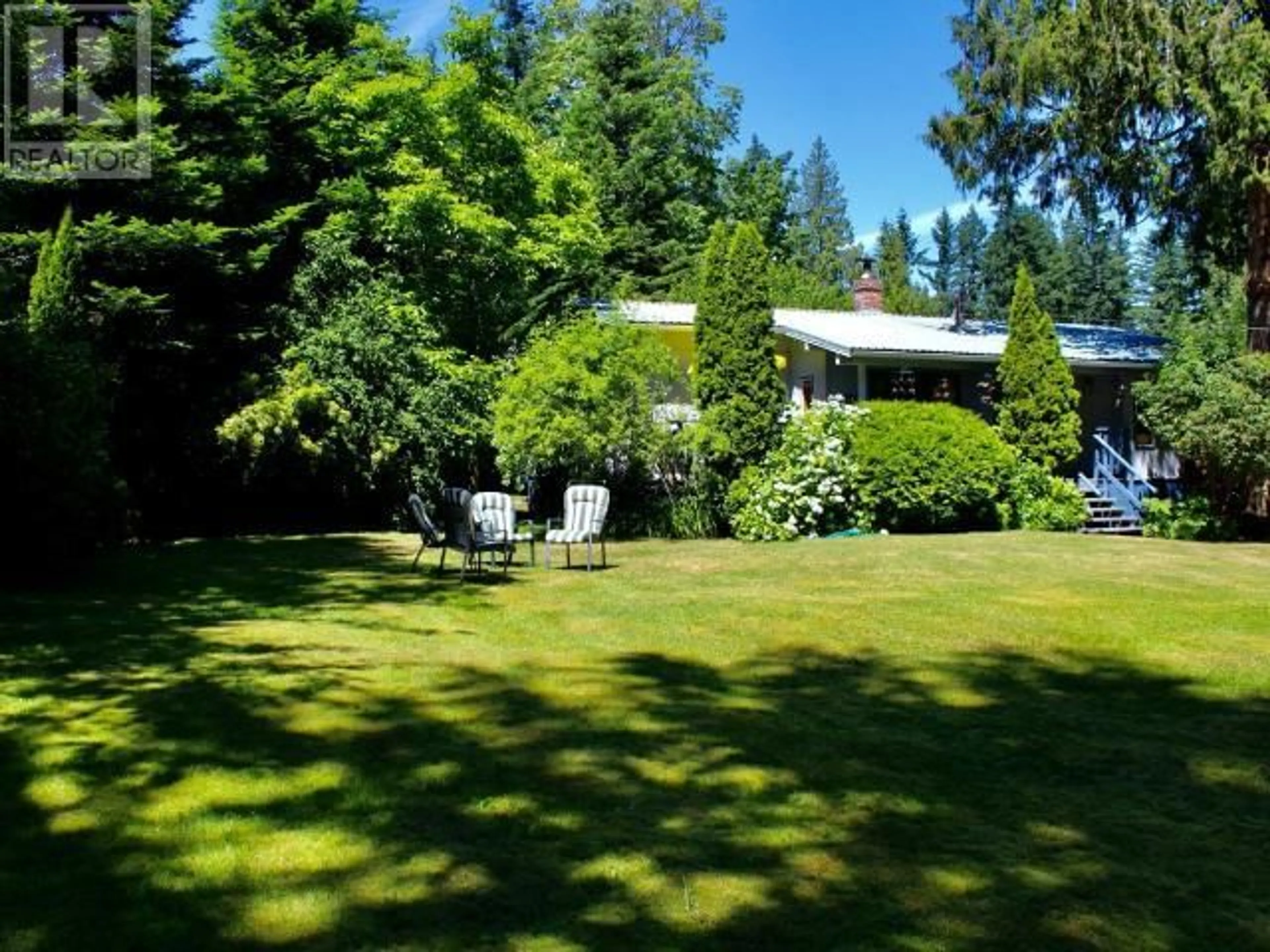 A pic from outside/outdoor area/front of a property/back of a property/a pic from drone, forest/trees view for 10136 DOUGLAS BAY ROAD, Powell River British Columbia V8A0K7