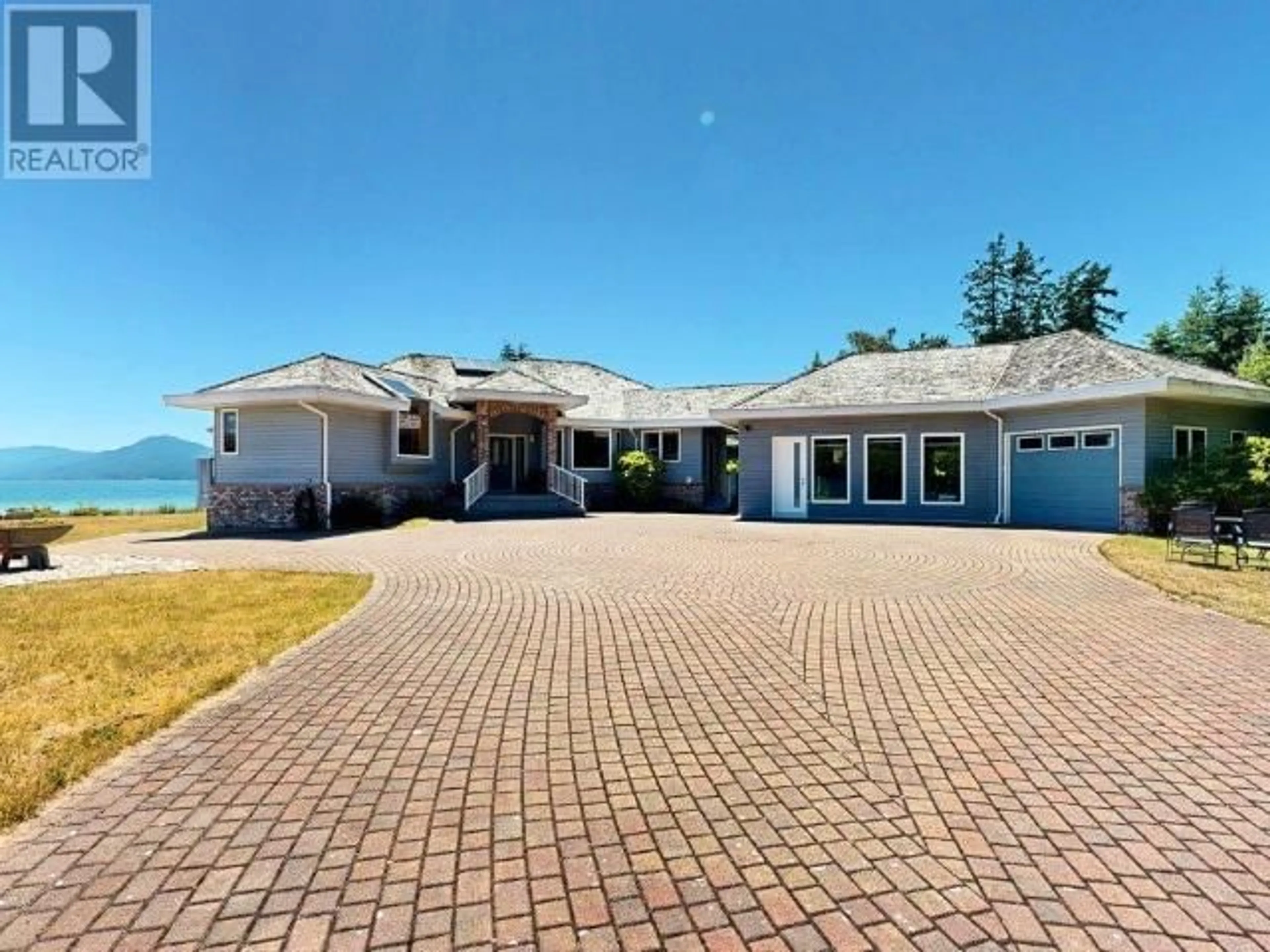 A pic from outside/outdoor area/front of a property/back of a property/a pic from drone, unknown for 10219 DOUGLAS BAY ROAD, Powell River British Columbia V8A0K7