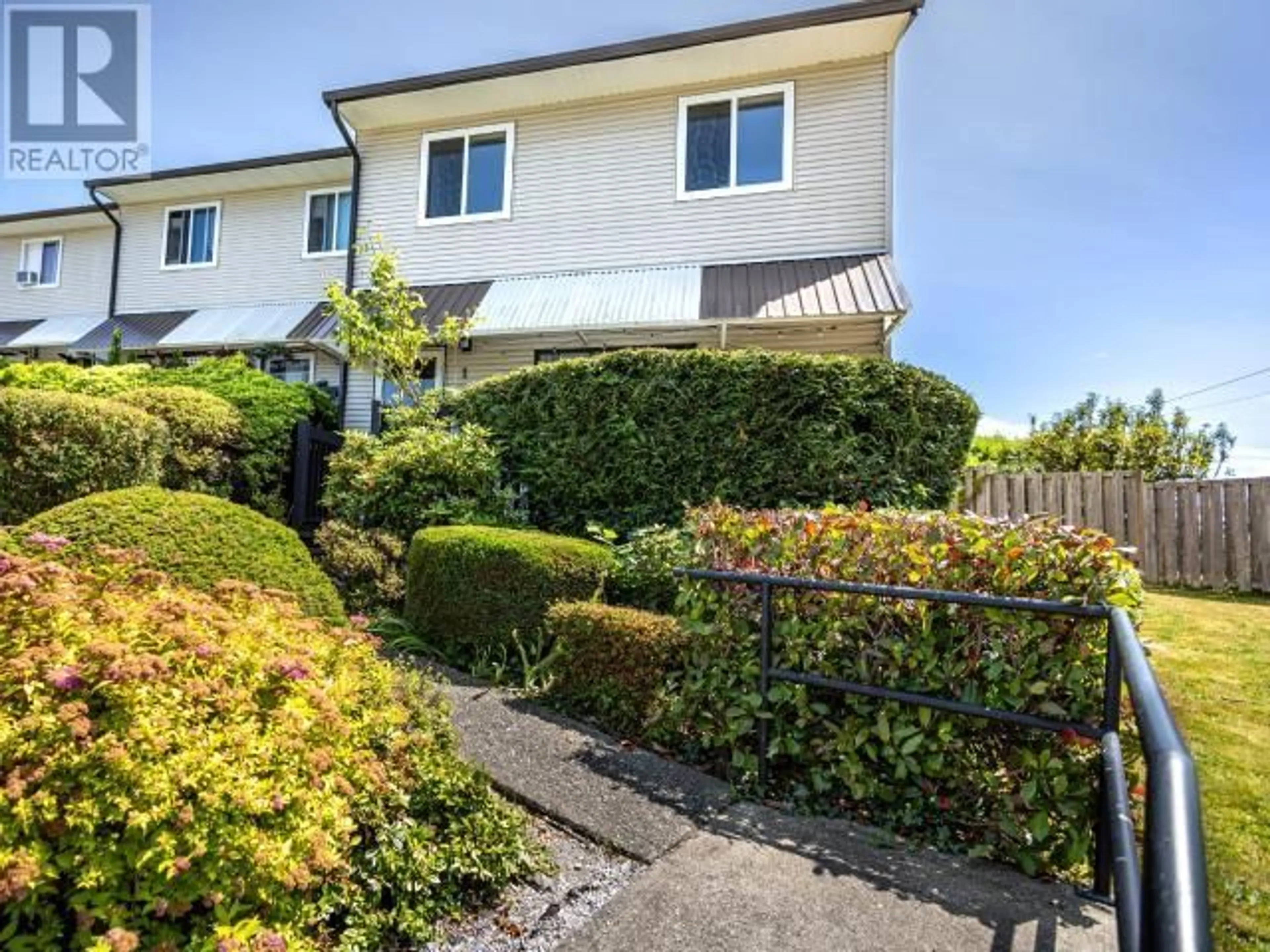 A pic from outside/outdoor area/front of a property/back of a property/a pic from drone, street for 1 - 4651 HARVIE AVE, Powell River British Columbia V8A2P4